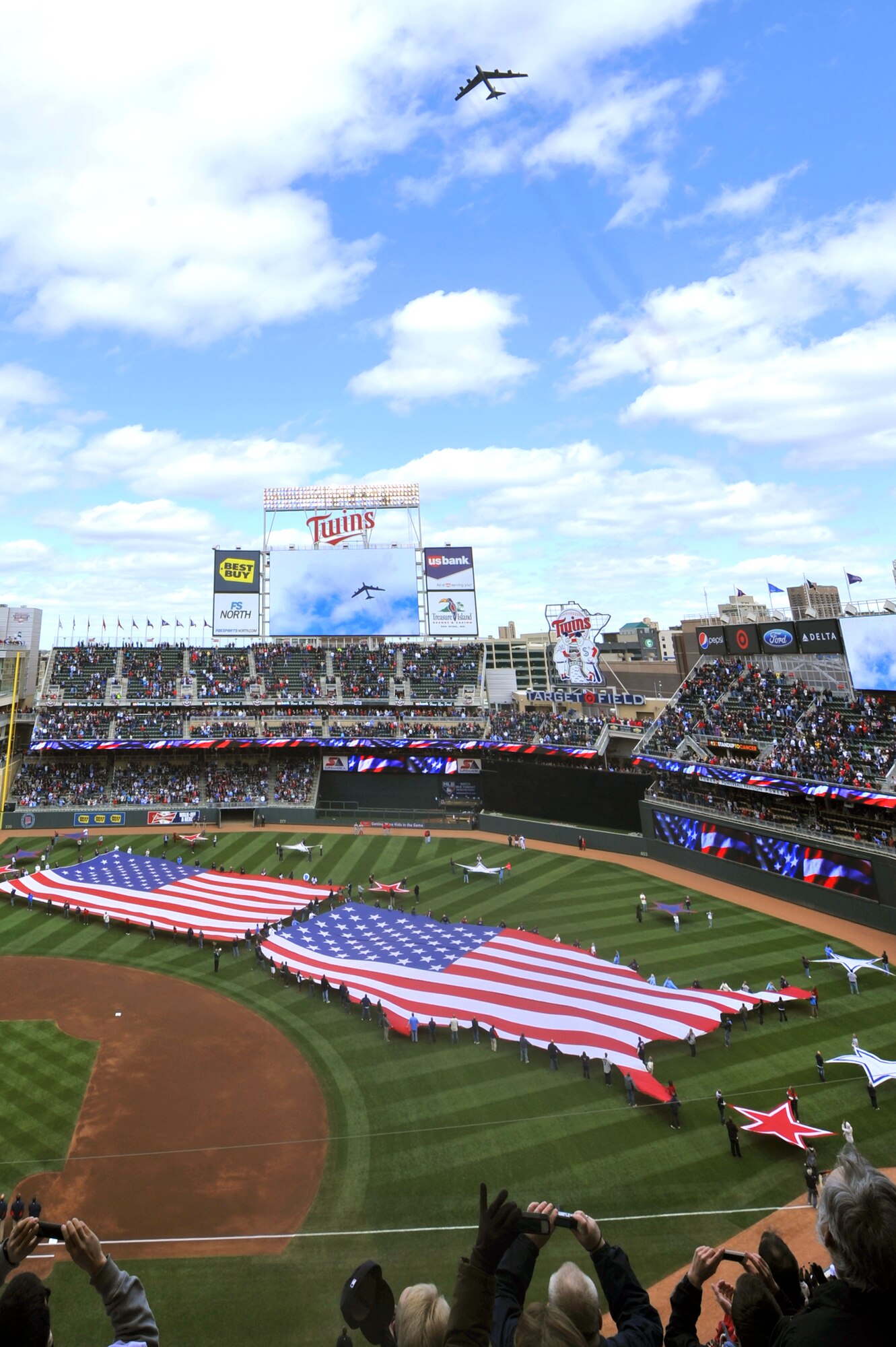 MINOT AIR FORCE BASE, N.D. -- A B-52H Stratofortress from here conducted a flyover at the Minnesota Twins Opening Baseball game April 9. (U.S. Air Force photo/Senior Airman Jesse Lopez)


