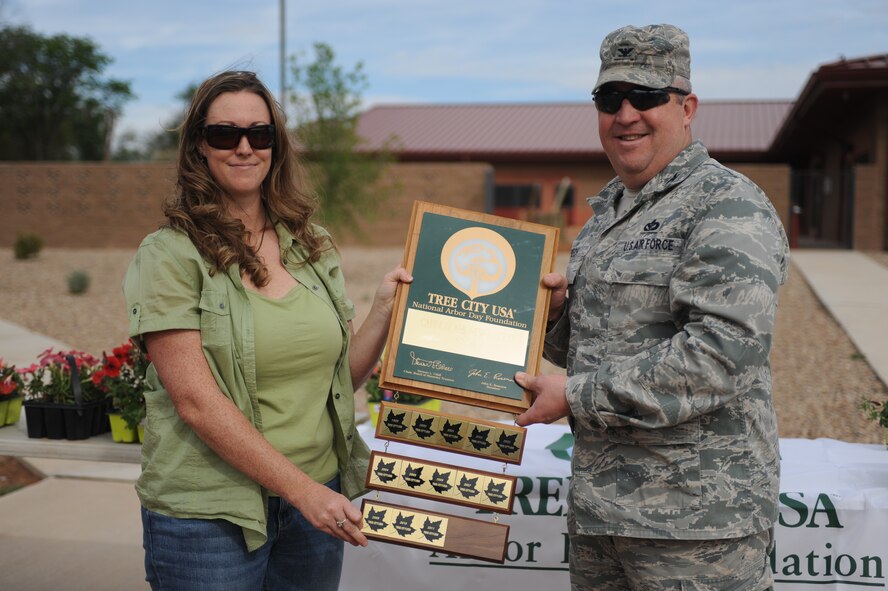 U.S. Air Force Col. David Piech, 27th Special Operations Mission Support Group commander proclaims April 19, 2012 as Arbor Day at Cannon Air Force Base, N.M. To commemorate this day, a ceremonial tree is planted and children from the Cannon Air Force Base Child Development Center planted some flowers. This ceremony marks the 20th year Cannon Air Force Base has celebrated Arbor Day and Earth Day and the 14th consecutive year that the National Arbor Day Foundation has designated Cannon Air Force Base as a Tree City USA community. (U.S. Air Force photos by Airman 1st Class Eboni Reece)
