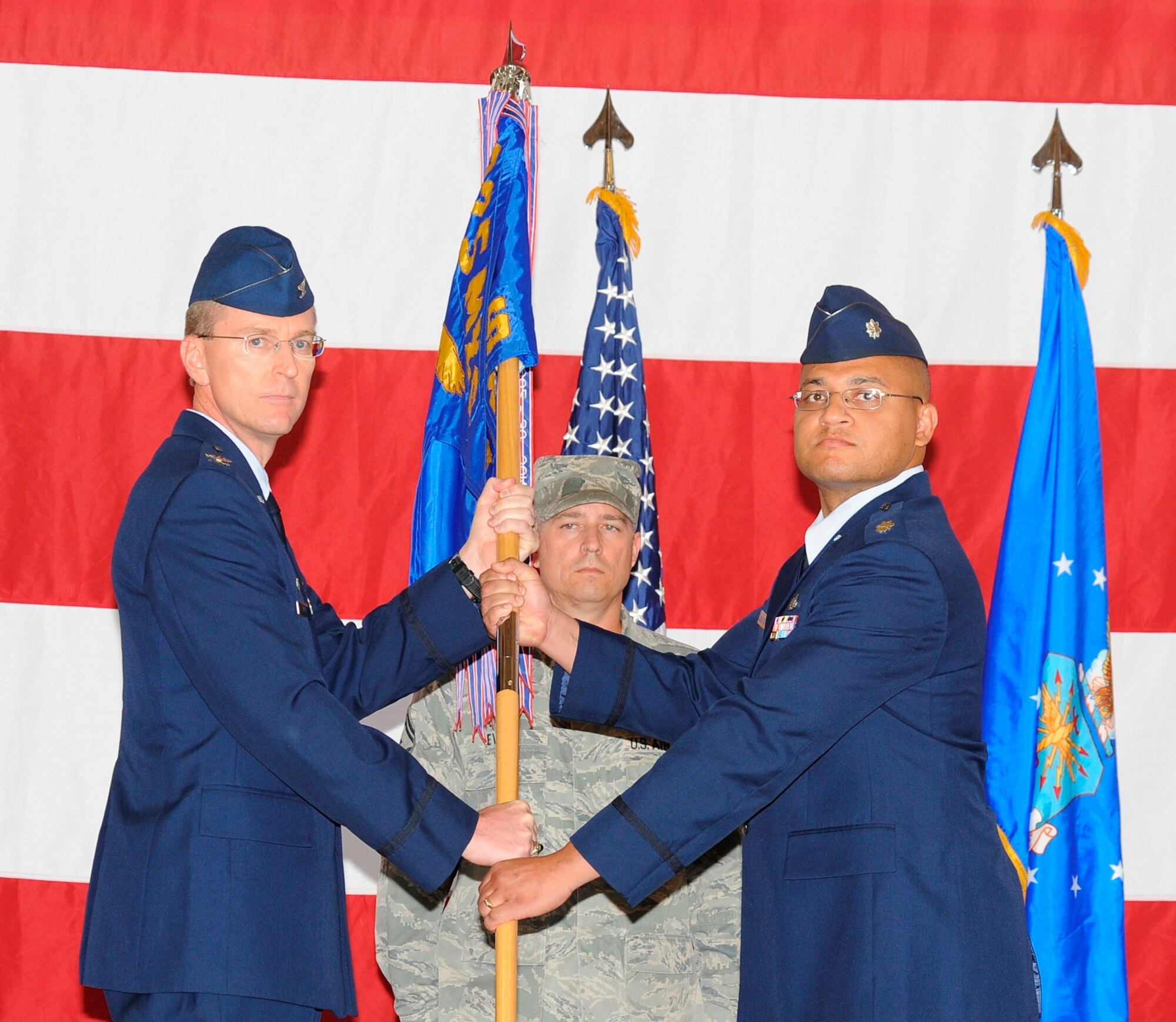 Lieutenant Col. Melvin Baskerville assumed command of the 325th Aircraft Maintenance Squadron from Lt. Col. Michael Ingersoll, April 20 during a change of command ceremony.  (U.S. Air Force photo by Lisa Norman)