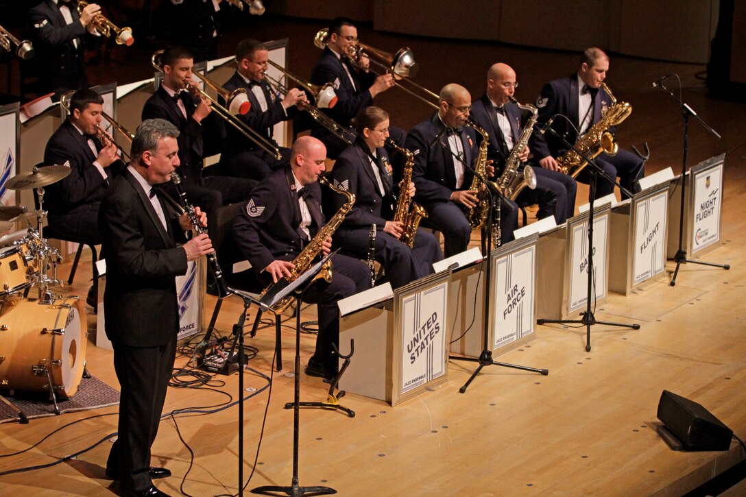 Alfred Savia, conductor of the Evansville Philharmonic is featured on a clarinet solo in a Glenn Miller tune with the Night Flight Jazz Ensemble. (U.S. Air Force photo/TSgt Felita Rowe) 