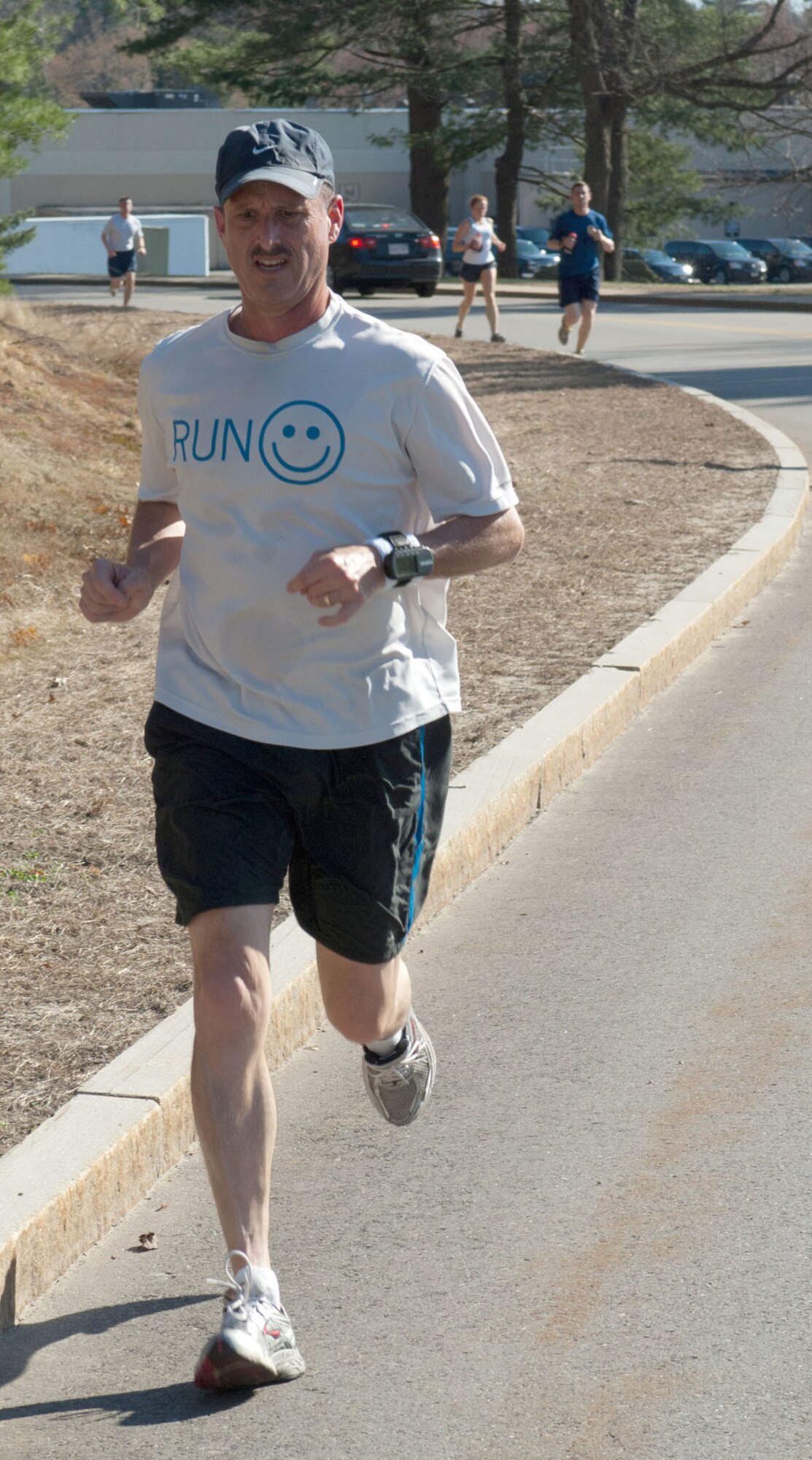 HANSCOM AIR FORCE BASE, Mass. - Col. Tim Nickerson, Electronic Systems Center chief of staff, runs in a 5K/10K here to benefit the Air Force Assistance Fund last month. Nickerson, who will be retiring from the Air Force, is an avid runner who was often seen around the base. (U.S. Air Force photo by Rick Berry) 
