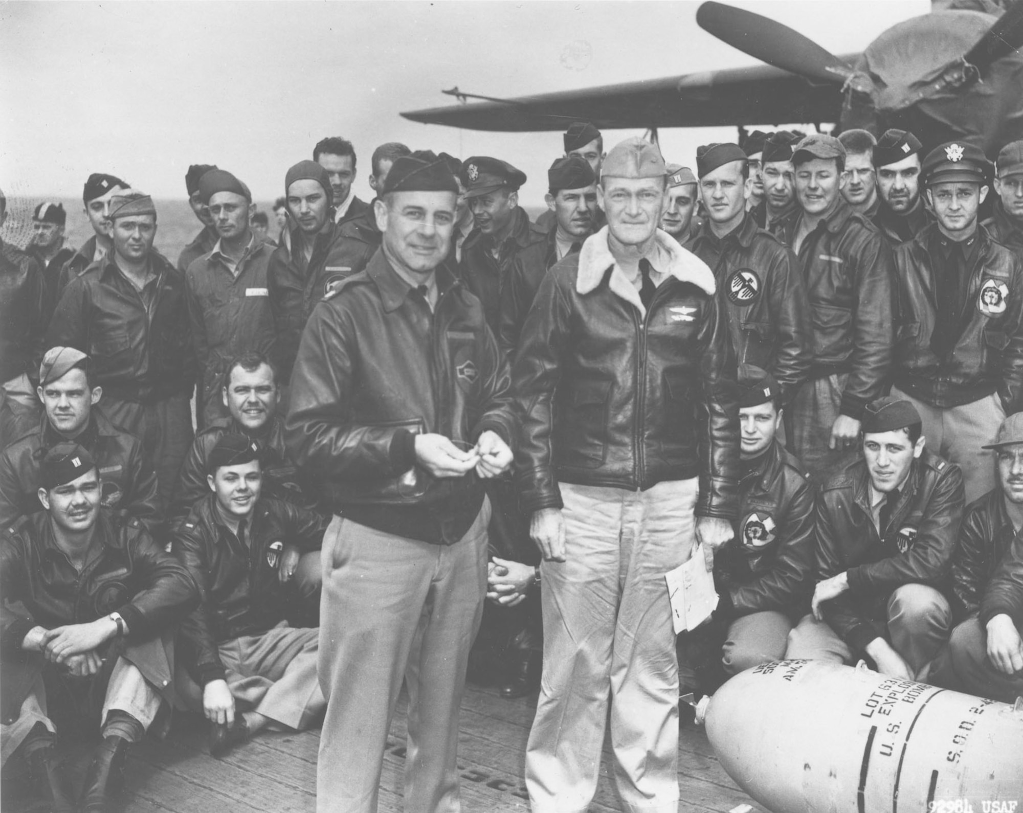 Lt. Col. Jimmy Doolittle accepts a medal from the skipper of the USS Hornet, Capt. Marc A. Mitscher. The medal, once given to a U.S. Navy officer by the Japanese, was wired to a 500-pound bomb for return to Japan 'with interest.' This week, 70 years after the bombing of Japan, the remaining Doolittle Raiders have gathered in Wright-Patterson AFB, Ohio, for what may be their last reunion. (Courtesy photo)