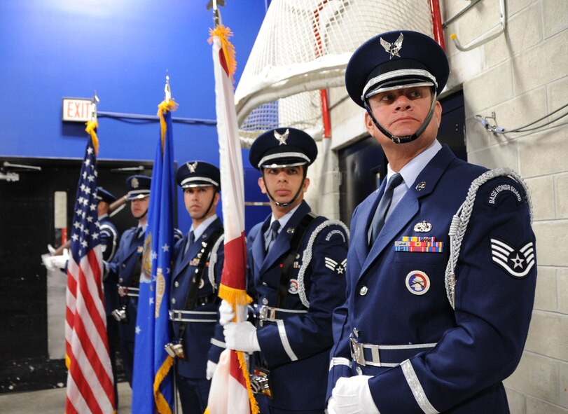 MACDILL AIR FORCE BASE, Fla. -- This 927th Honor Guard recently presented the colors at a Tampa Bay Storm game, attended by more than 8,000 fans. From left to right, they were composed of Staff Sgt. Brandon Studebaker, a crew chief with the 927th Aircraft Maintenance Squadron, Capt. Brian Cleveland, the executive officer of the Mission Support Group, Senior Airman Francisco Magana-Zaragoza, a ??? with the 45th Aeromedical Evacuation Squadron, Senior Airman Carlos Monge and Staff Sgt. Rob MacEachern, both aerospace ground equipment mechanics with the 927th Maintenance Squadron.  The honor guard is part of the 927th Air Refueling Wing, a reserve unit stationed at MacDill.  (Official U.S. Air Force photo by Staff Sgt. Jennie Chamberlin)