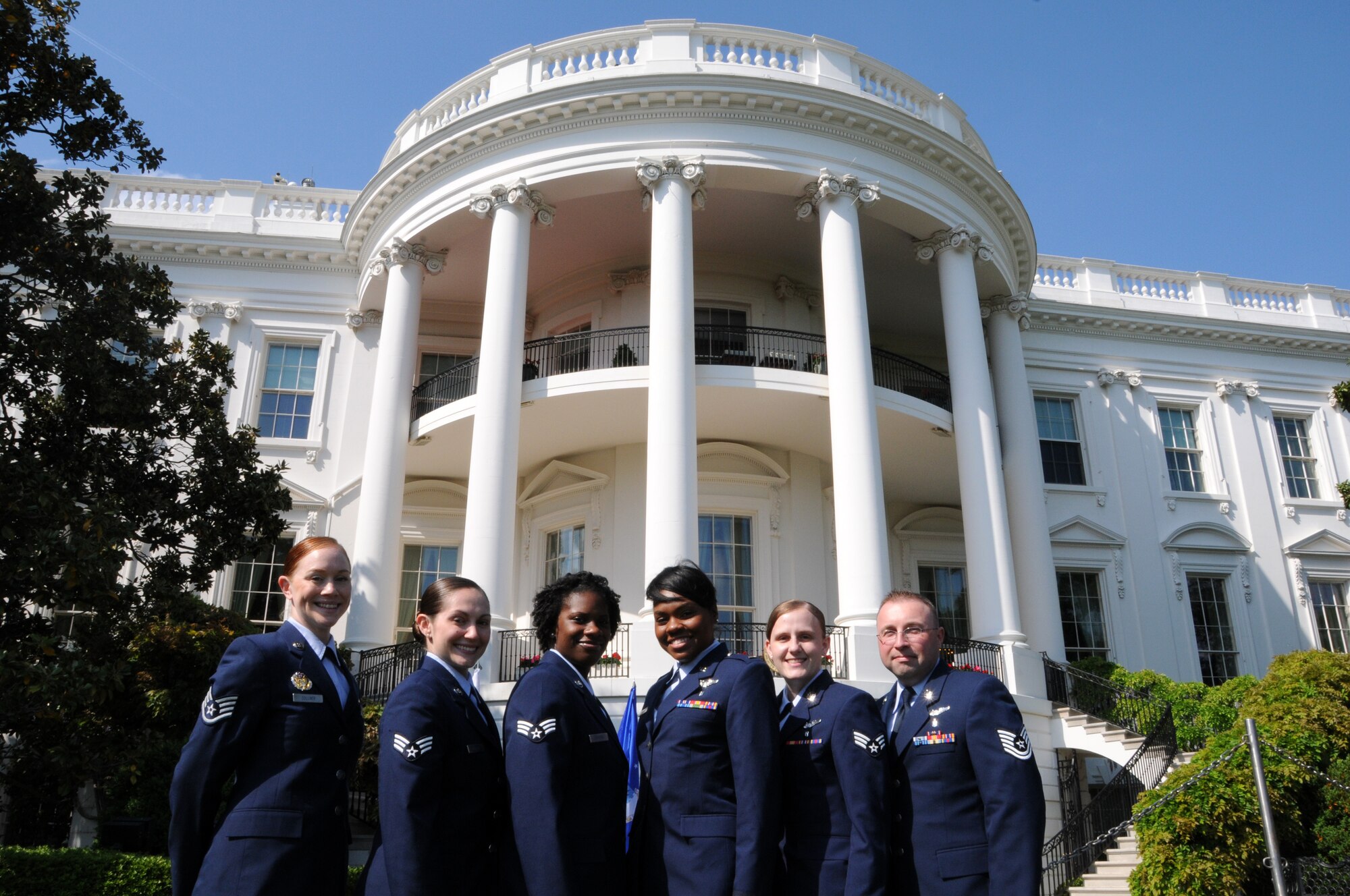 Members from the 459th Air Refueling Wing at Joint Base Andrews, Md., pose for a picture in front of the White House during the sixth annual Wounded Warrior Soldier Ride, April 20, 2012. The soldier ride is a unique four-day cycling opportunity for wounded warriors to use cycling and the bonds of service to overcome physical, mental, or emotional wounds. (U.S. Air Force photo/ Senior Airman Katie Spencer)
