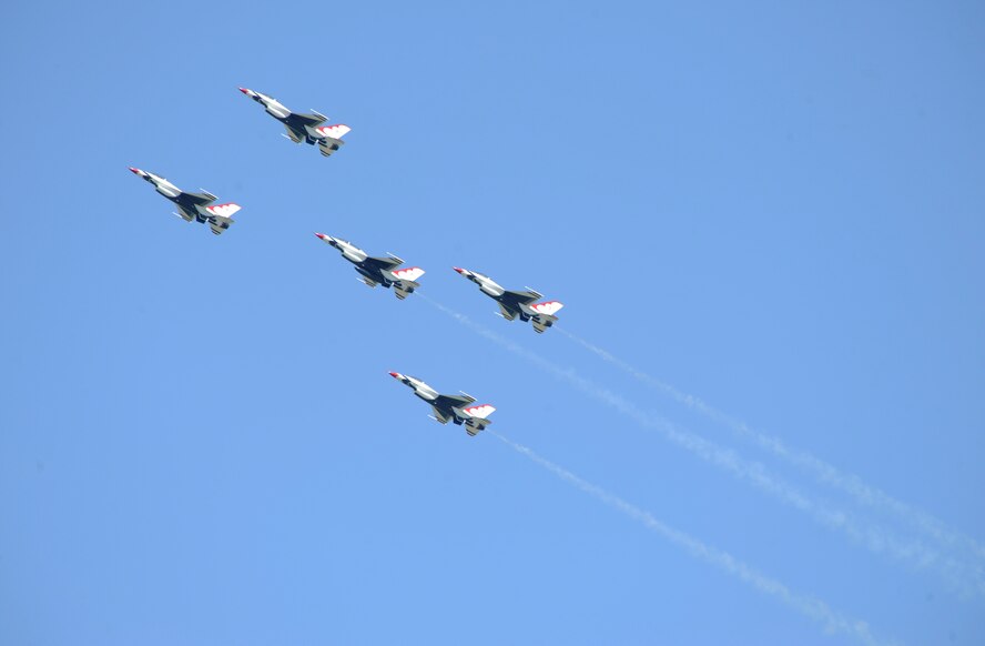 U.S. Air Force Thunderbird F-16 Fighting Falcons perform an aerial maneuver at the 2012 Barksdale Air Force Base Defenders of Liberty Air Show April 21. In addition to the Thunderbirds' performance, this free and open to the public two-day event included an open house and several aerial demonstrations by the Red Bull Jumpers, A-10 Thunderbolt II Warthogs, B-2 Spirit, Black Diamond Aerobatic Team and much more. (U.S. Air Force photo/Airman 1st Class Benjamin Gonsier)(RELEASED)