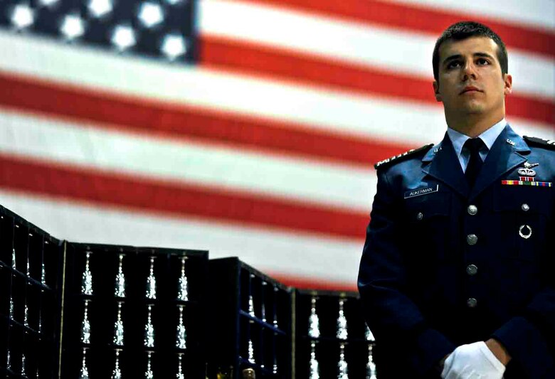 Cadet Chad Aukerman, Squadron Commander of Cadet Sq. 11 at Air Force Academy, performs the honor of goblet detail during the Doolittle Tokyo Raiders 70th Reunion, April 19 at a banquet for the historic reunion at the National Museum of the U.S. Air Force. Two cadets are selected by the senior staff of the History Department of the Academy to perform the detail during Raider reunions.  (U.S. Air Force photo by Tech. Sgt. Bennie J. Davis III)