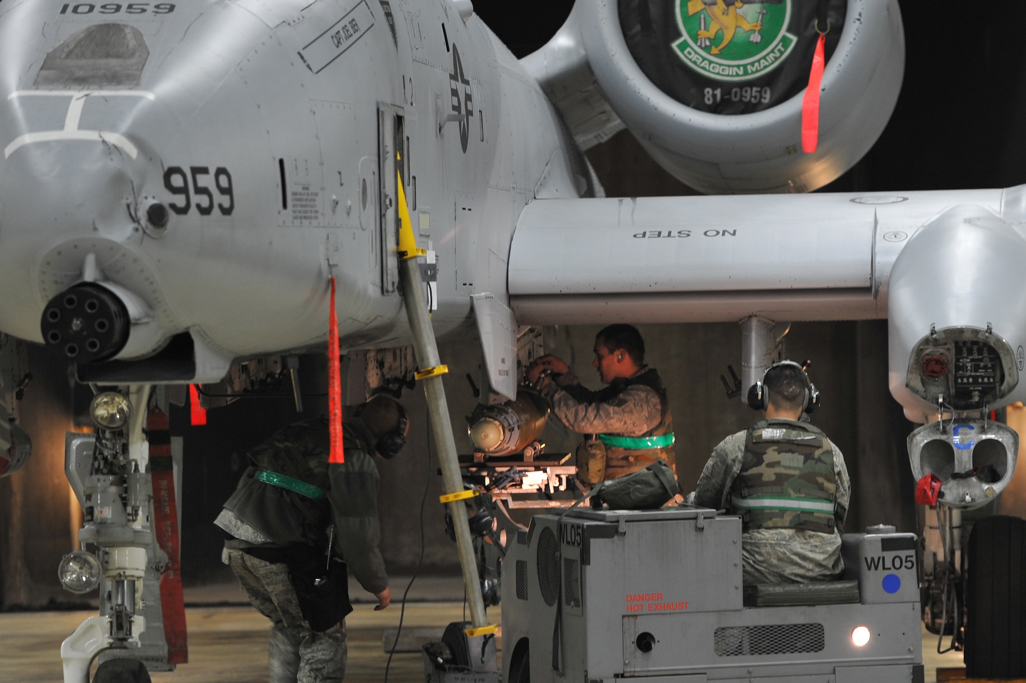 Members of the 25th Aircraft Maintenance Unit load munitions onto an A-10 Thunderbolt II during Beverly Midnight 12-02, an operational readiness exercise at Osan Air Base, Republic of Korea, April 23, 2012. BM 12-02 is the second half of Team Osan’s two-week consolidated unit inspection. (U.S. Air Force photo/Staff Sgt. Craig Cisek)