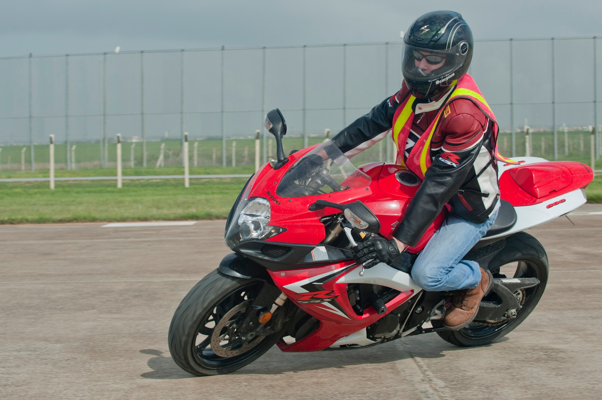 Tech. Sgt. James Duffy, 39th Maintenance Squadron, maneuvers his motorcycle through a riding course during a Motorcycle Safety Rodeo April 20, 2012, at Incirlik Air Base, Turkey. The safety rodeo is required for all military motorcycle riders for on-and off-base driving. (U.S. Air Force photo by Senior Airman Anthony Sanchelli/Released)
