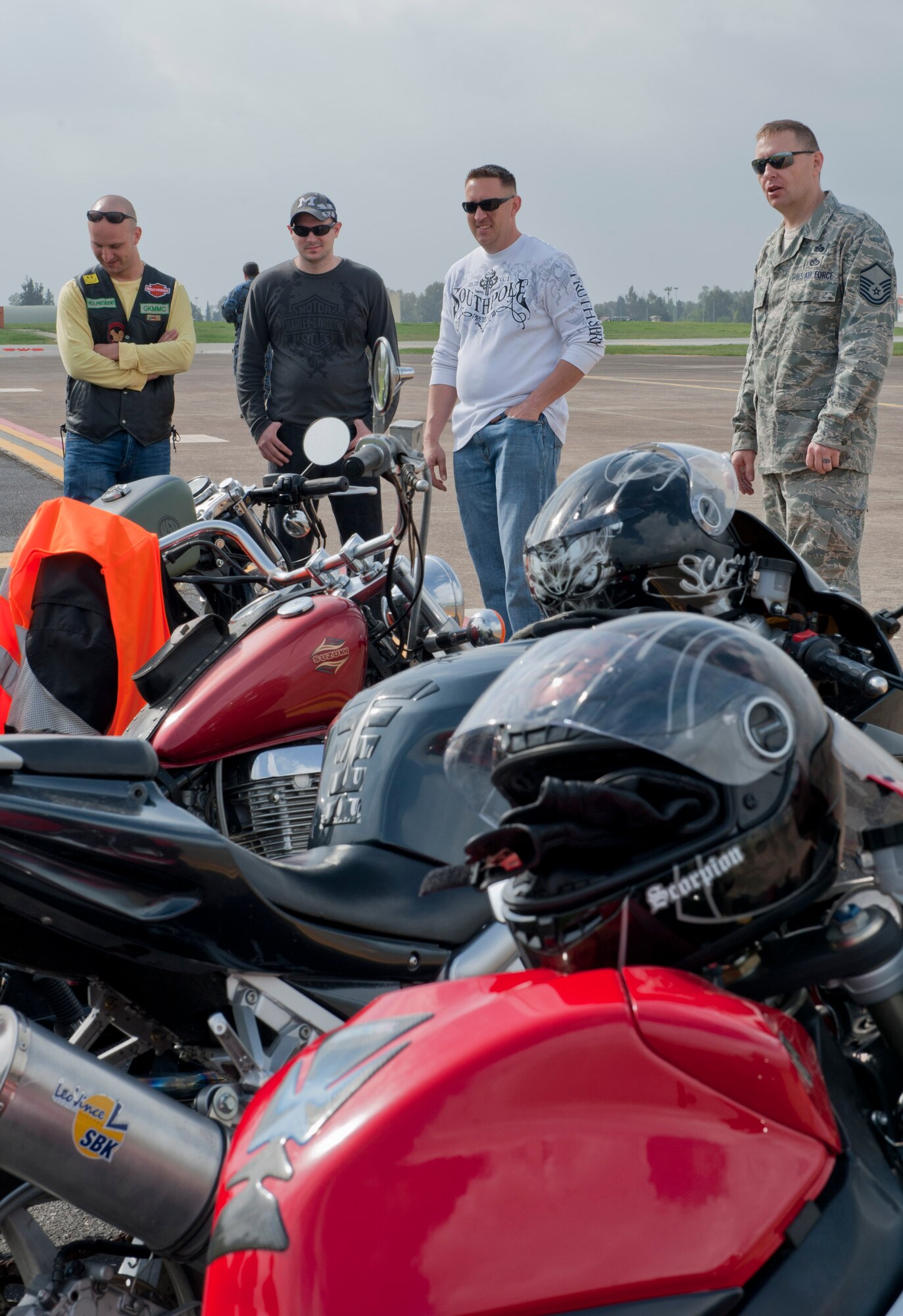 Master Sgt. Thomas Eckert, Green Knights Motorcycle Club president, right, gives a safety briefing during a Motorcycle Safety Rodeo April 20, 2012, at Incirlik Air Base, Turkey. The safety rodeo is required for all military motorcycle riders for on-and off-base driving. (U.S. Air Force photo by Senior Airman Anthony Sanchelli/Released)
