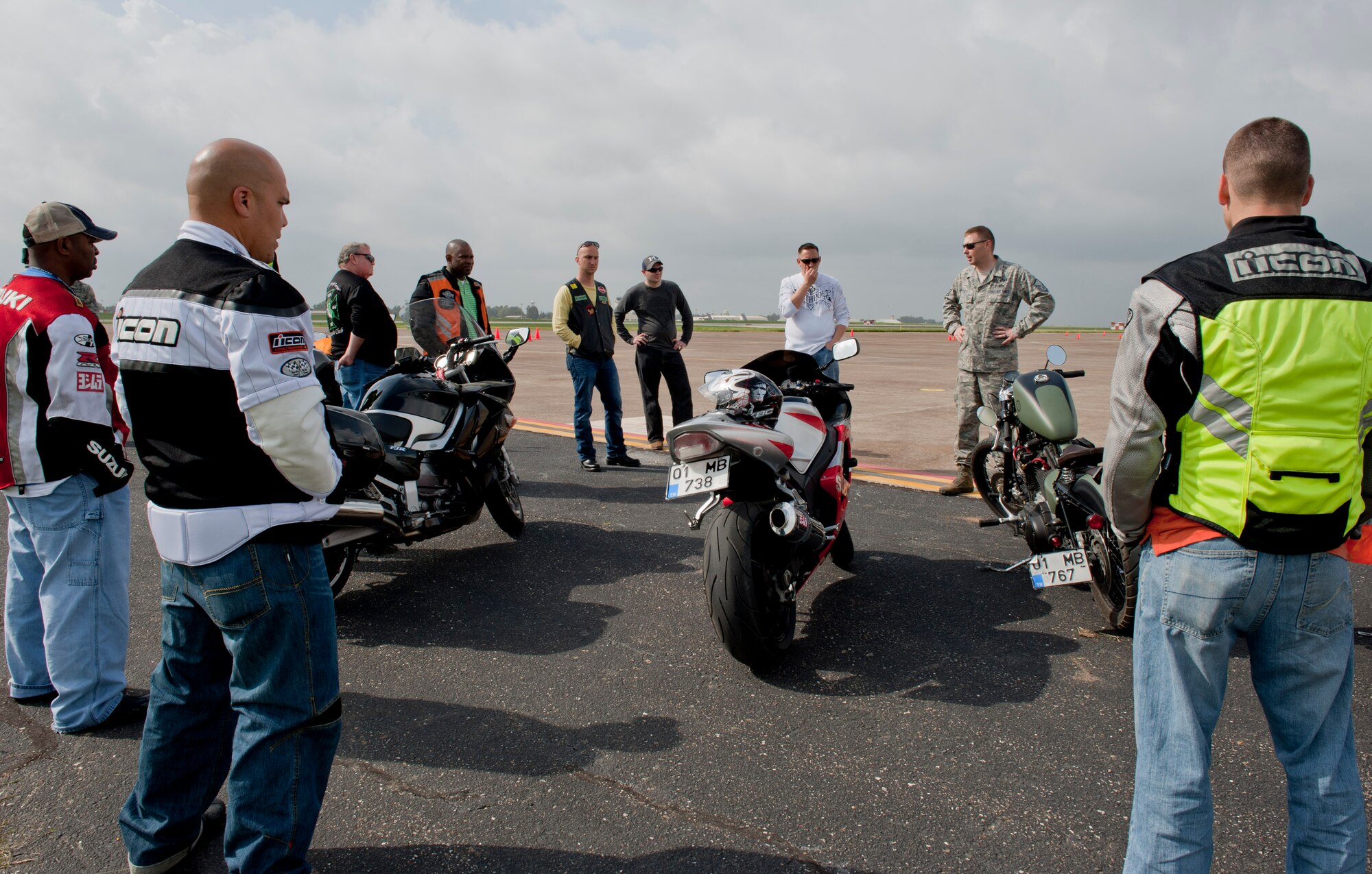 Master Sgt. Thomas Eckert, Green Knights Motorcycle Club president, second from right, gives a safety briefing during a Motorcycle Safety Rodeo April 20, 2012, at Incirlik Air Base, Turkey. The safety rodeo is required for all military motorcycle riders for on-and off-base driving. (U.S. Air Force photo by Senior Airman Anthony Sanchelli/Released)
