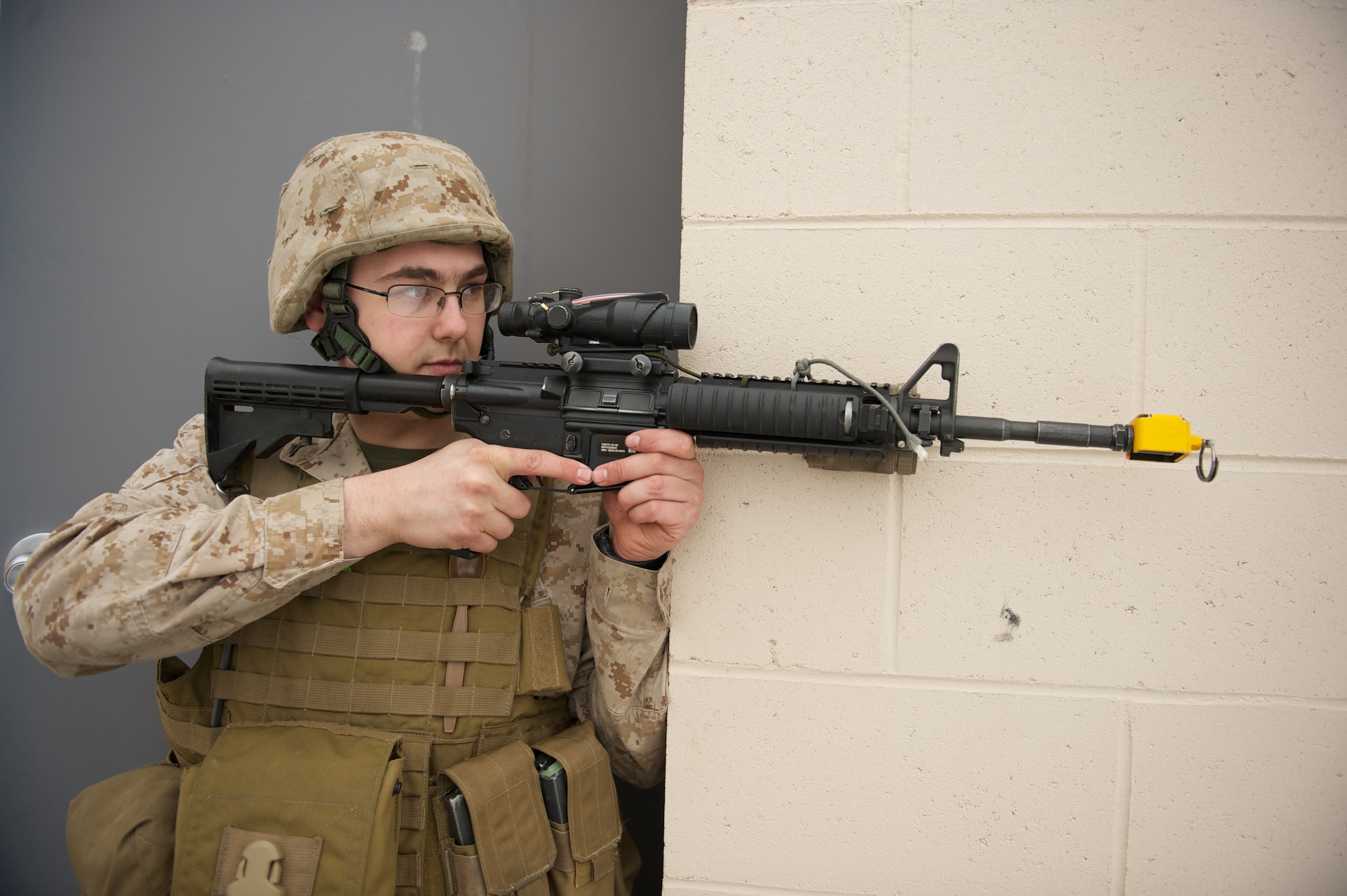 JOINT BASE ELMENDORF-RICHARDSON, Alaska -- Lance Cpl. Grant Badgerroberts of Palmer, D Company, Anti-Terrorism Battalion, provides security April 21 during training in urban operations at JBER's Baumeister City MOUT Complex. (U.S. Air Force photo/David Bedard)