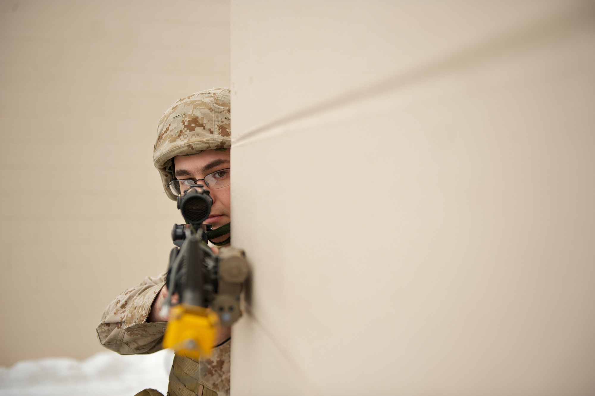 JOINT BASE ELMENDORF-RICHARDSON, Alaska -- Lance Cpl. Grant Badgerroberts of Palmer, D Company, Anti-Terrorism Battalion, provides security April 21 during training in urban operations at JBER's Baumeister City MOUT Complex. (U.S. Air Force photo/David Bedard)