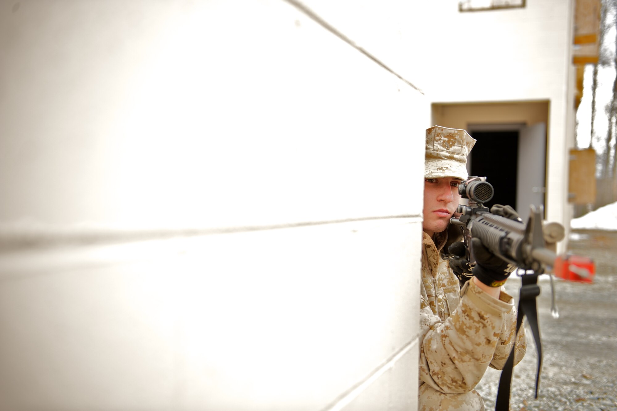 JOINT BASE ELMENDORF-RICHARDSON, Alaska -- Pfc. Kevin Corey, D Company, Anti-Terrorism Battalion, of Anchorage, provides security April 21 during training in urban operations at JBER's Baumeister City MOUT Complex. (U.S. Air Force photo/David Bedard)