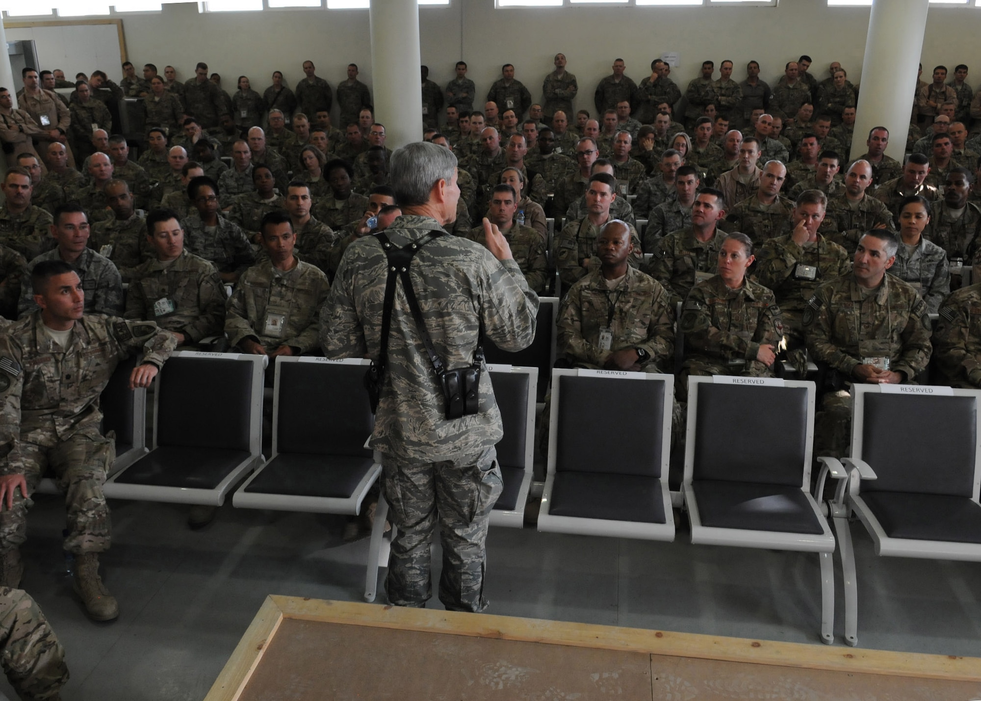 Air Force Chief of Staff Gen. Norton Schwartz talks with Airmen from the 438th Air Expeditionary Wing and the International Security Assistance Force Joint Command April 23, 2012, during his visit to Kabul International Airport, Afghanistan. The general discussed resiliency issues effecting today?s Airmen and their families, changes in service capabilities, and Air Force budget priorities. (U.S. Air Force photo/Staff Sgt. Nadine Y. Barclay)

