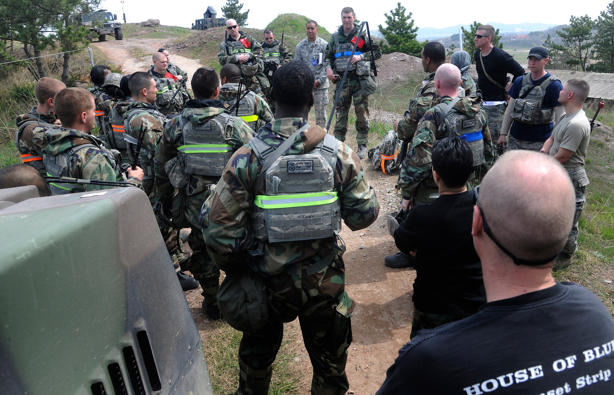 A Pacific Air Force’s Inspector General Team member along with Exercise Evaluation Team members provide feedback to 8th Security Forces Squadron personnel after their completed scenario during the operational readiness exercise at Kunsan Air Base, Republic of Korea, April 24, 2012. This is the last phase of inspections by the PACAF IG Team.  The Wolf Pack will find out the inspection results on May 2 after the IG Team has finalized their report.  (U.S. Air Force photo/Staff Sgt. Rasheen A. Douglas)
