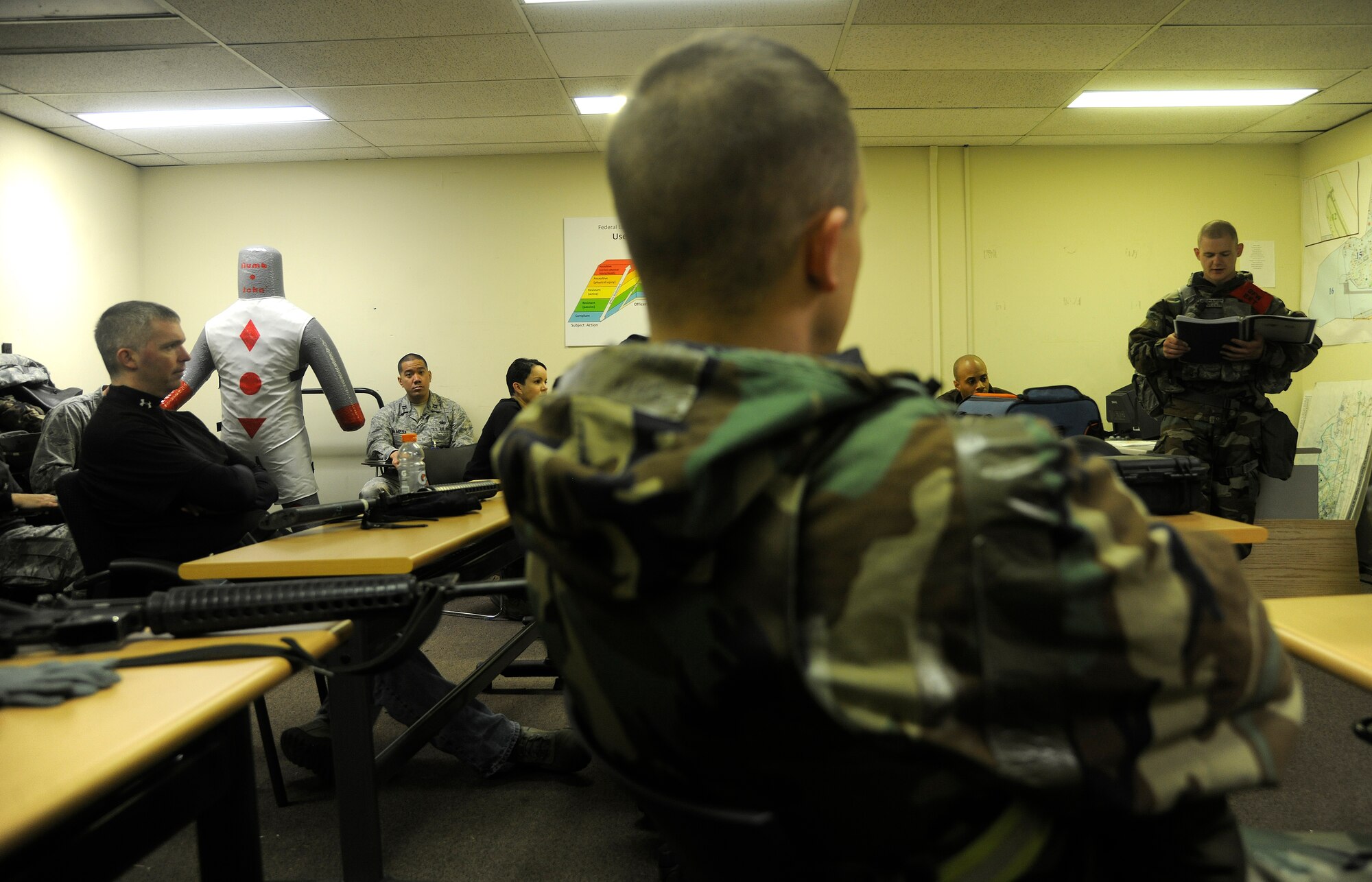 An 8th Security Forces Squadron Exercise Evaluation Team member briefs opposing forces role players for a scenario to test the Defenders capabilities during an operational readiness exercise at Kunsan Air Base, Republic of Korea, April 24, 2012. During the simulated operation, the 8th SFS members engaged opposing forces that are played by the Wolf Pack’s first sergeants. (U.S. Air Force photo/Staff Sgt. Rasheen A. Douglas)