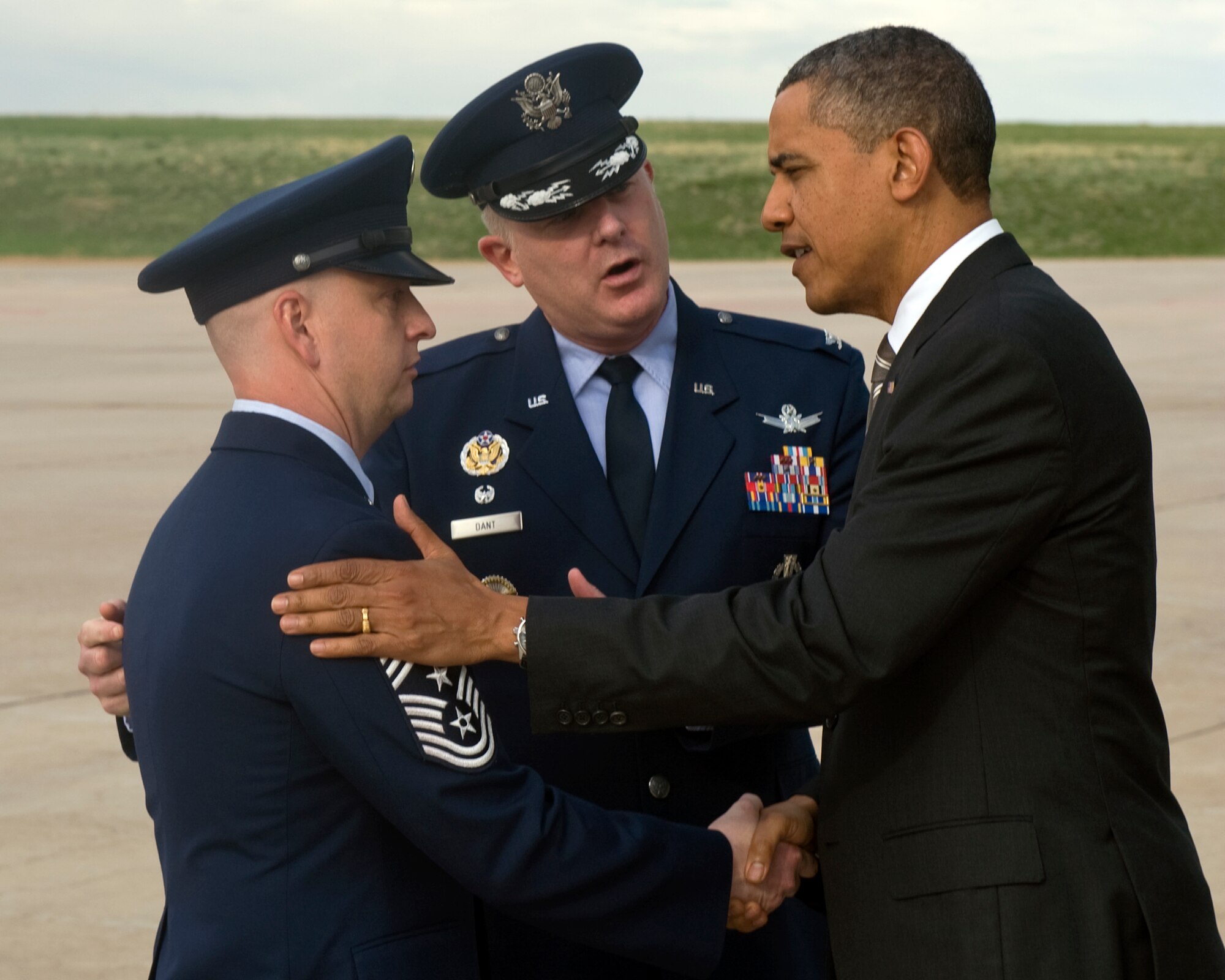 BUCKLEY AIR FORCE BASE, Colo. – President Barack Obama speaks with Chief Master Sgt. William Ward, 460th Space Wing command chief, left, and Col. Daniel Dant, 460th Space Wing commander, April 24, 2012. Obama will speak at the University of Colorado Boulder concerning student loan interest rates. (U.S. Air Force photo by Airman 1st Class Riley Johnson)