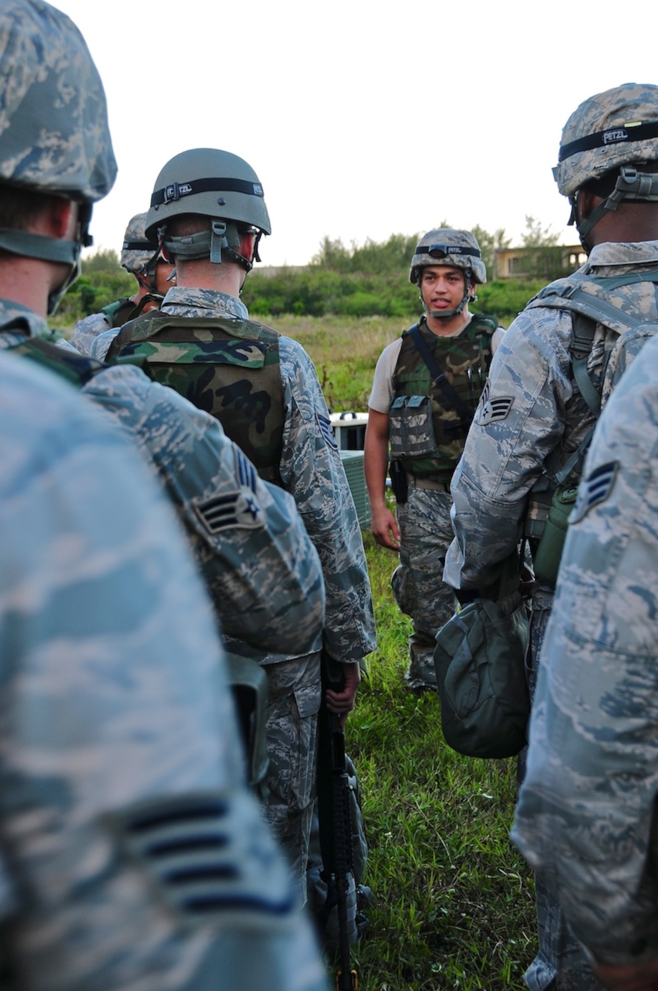 Capt. Mark Walkusky, 644th Combat Communications Squadron, brings Airmen up to speed upon their arrival at the simulated Forward Operating Base Dragon Hill. The 644 CBCS is conducting a deployment exercise from April 16 to 27 in order to test their capabilities out on the field and improve war-fighting capabilities. (U.S. Air Force photo by Airman 1st Class Marianique Santos)