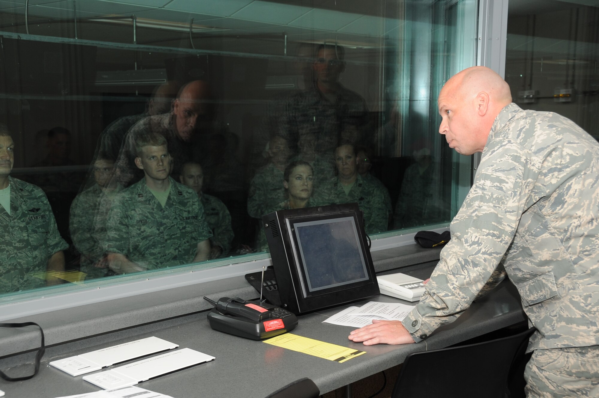 Col. Glen Downing, 81st Training Wing vice commander, welcomes the audience to the 81st Security Forces Squadron firing range ribbon cutting April 20, 2012, at Keesler Air Force Base, Miss.  The small arms firing range is a $5.3 million project that will provide weapons training and qualification to 81st Security Forces Squadron members and others who need weapons qualification for deployments. Previously, Keesler members had to travel 17 miles to the Navy's combat arms training and maintenance facility at Camp Keller, Miss.  Construction began in November 2011 and the safety test was completed March 28. (U.S. Air Force photo by Kemberly Groue)