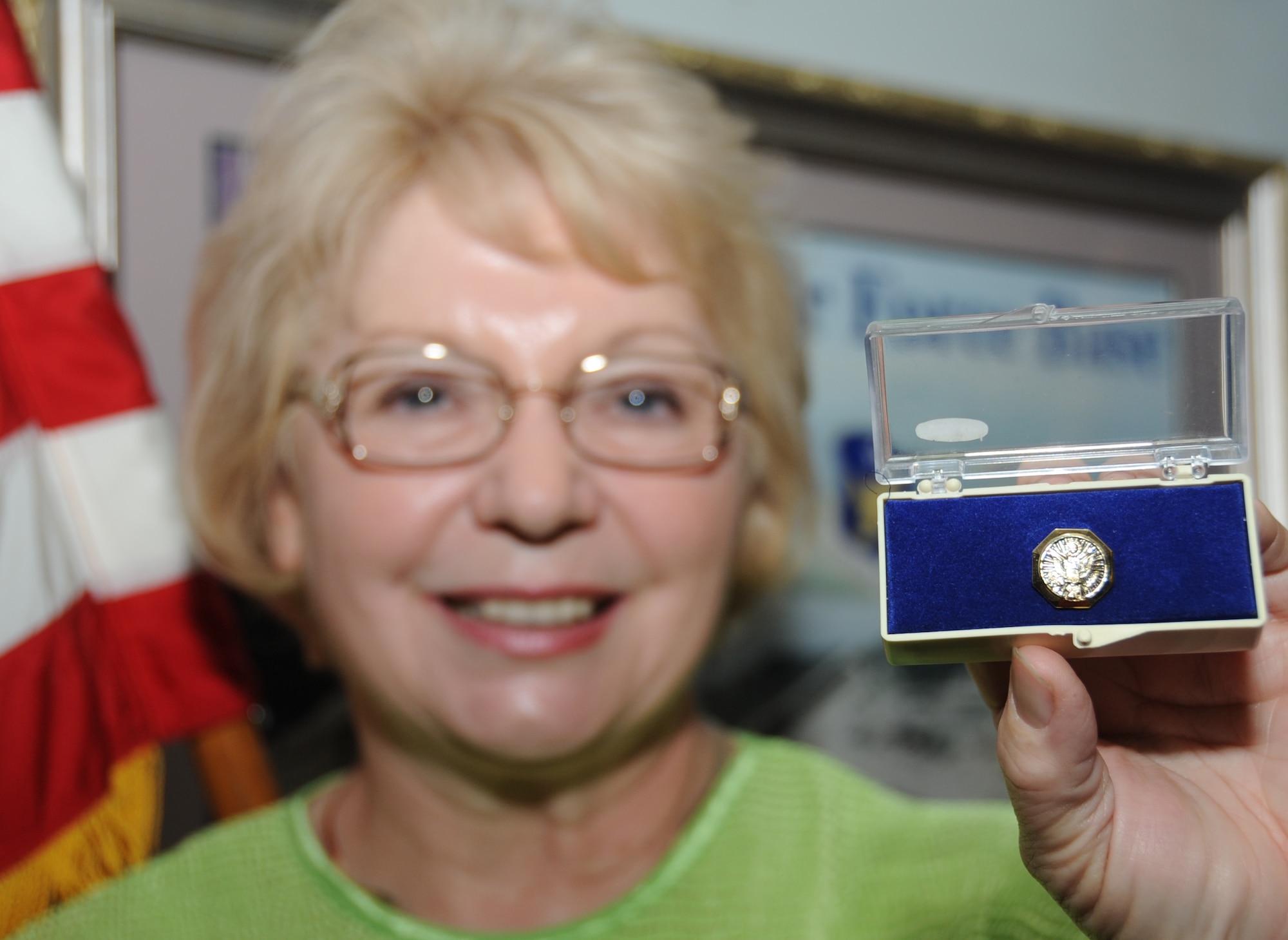 Ruthie Atchley, 81st Communications Squadron chief of base records management, received a 40-year pin for her commitment to the Air Force as a Department of Defense civil service member April 17, 2012, at the 81st CS building, Keesler Air Force Base, Miss.  (U.S. Air Force photo by Kemberly Groue)