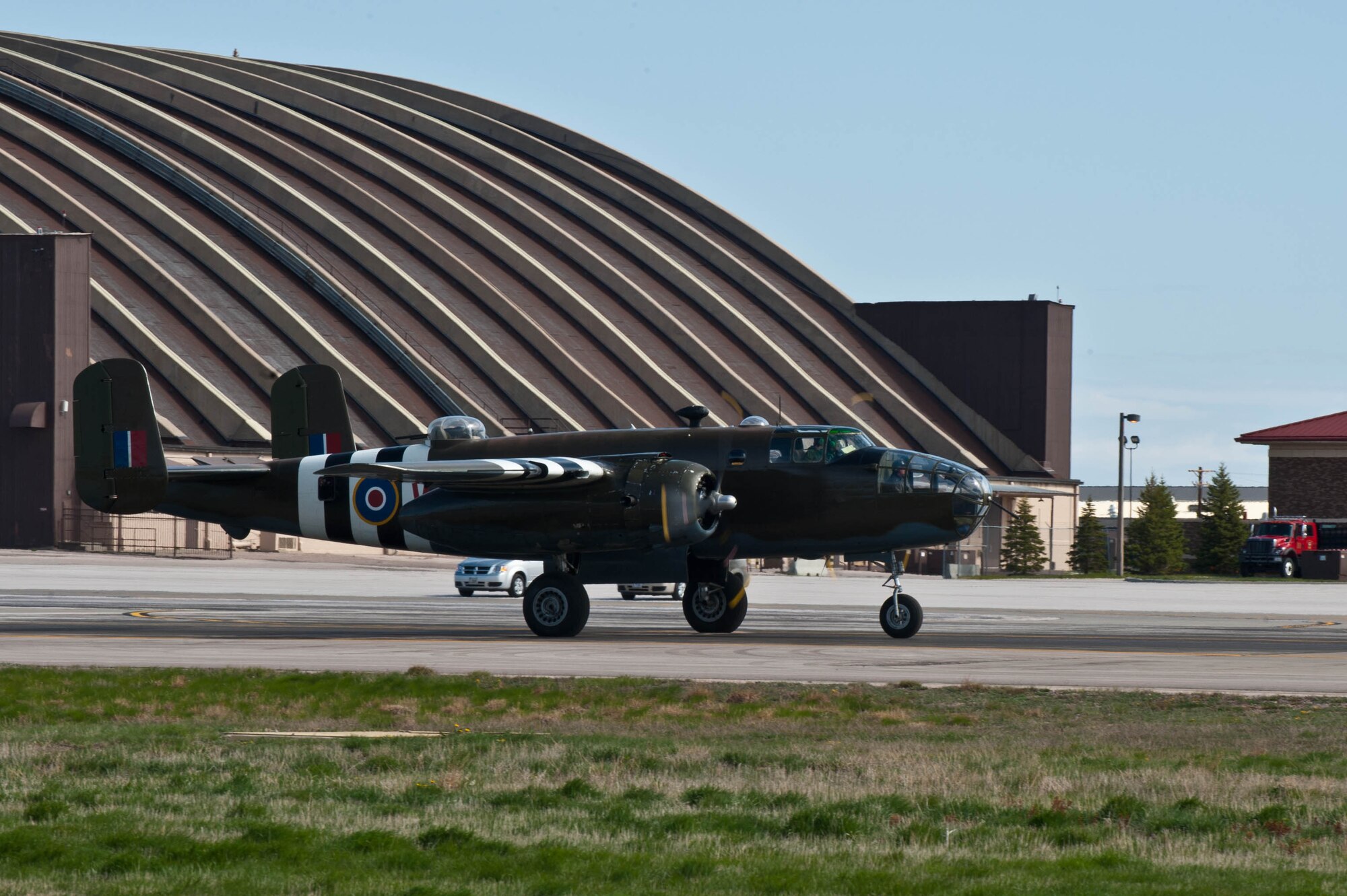 A B-25D Mitchell Bomber from the Historic Flight Foundation named “Grumpy” taxis down the flightline to prepare for take off at Ellsworth Air Force Base, S.D., April 20, 2012. The visit to Ellsworth was a part of its return journey to Snohomish County Airport north of Seattle, Wash., from the final Doolittle Raider reunion event held at the National Museum of the U.S. Air Force in Ohio.  “Grumpy” is one of the oldest flying B-25s in the world, and most closely resembles the variant of the 16 bombers flown by Lt. Col. James Doolittle and his crews. (U.S. Air force photo by Airman 1st class Zachary Hada/Released)