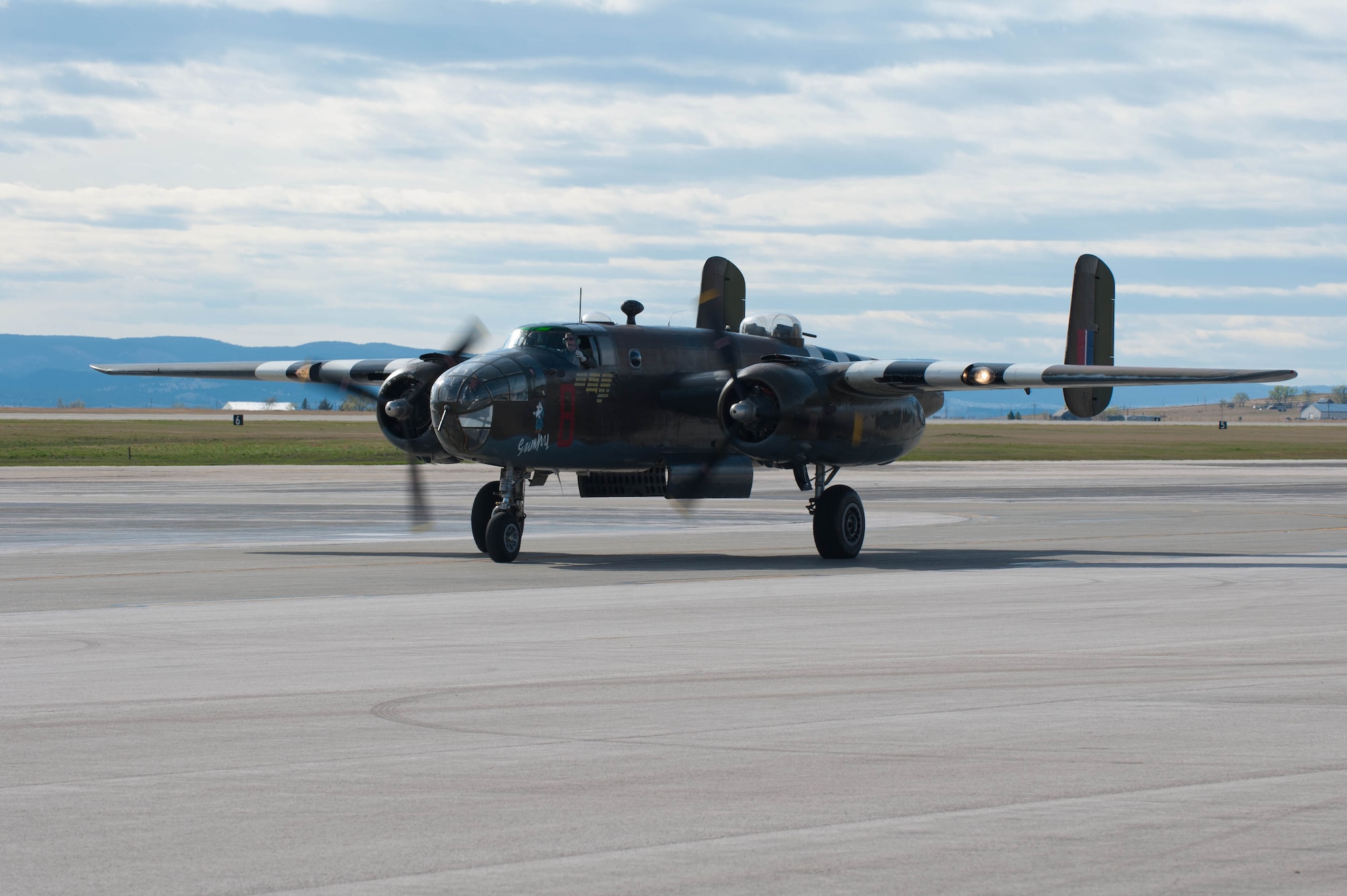 “Grumpy” a B-25D Mitchell Bomber from the Historic Flight Foundation arrives at Ellsworth Air Force Base, S.D., April 20, 2012 as part of its return journey to Snohomish County Airport north of Seattle, Wash., from the final Doolittle Raider reunion event held at the National Museum of the U.S. Air Force in Ohio.  “Grumpy” is one of the oldest flying B-25s in the world, and most closely resembles the variant of the 16 bombers flown by Lt. Col. James Doolittle and his crews during the famous Doolittle Raid. (U.S. Air force photo by Airman 1st class Zachary Hada/Released)c
