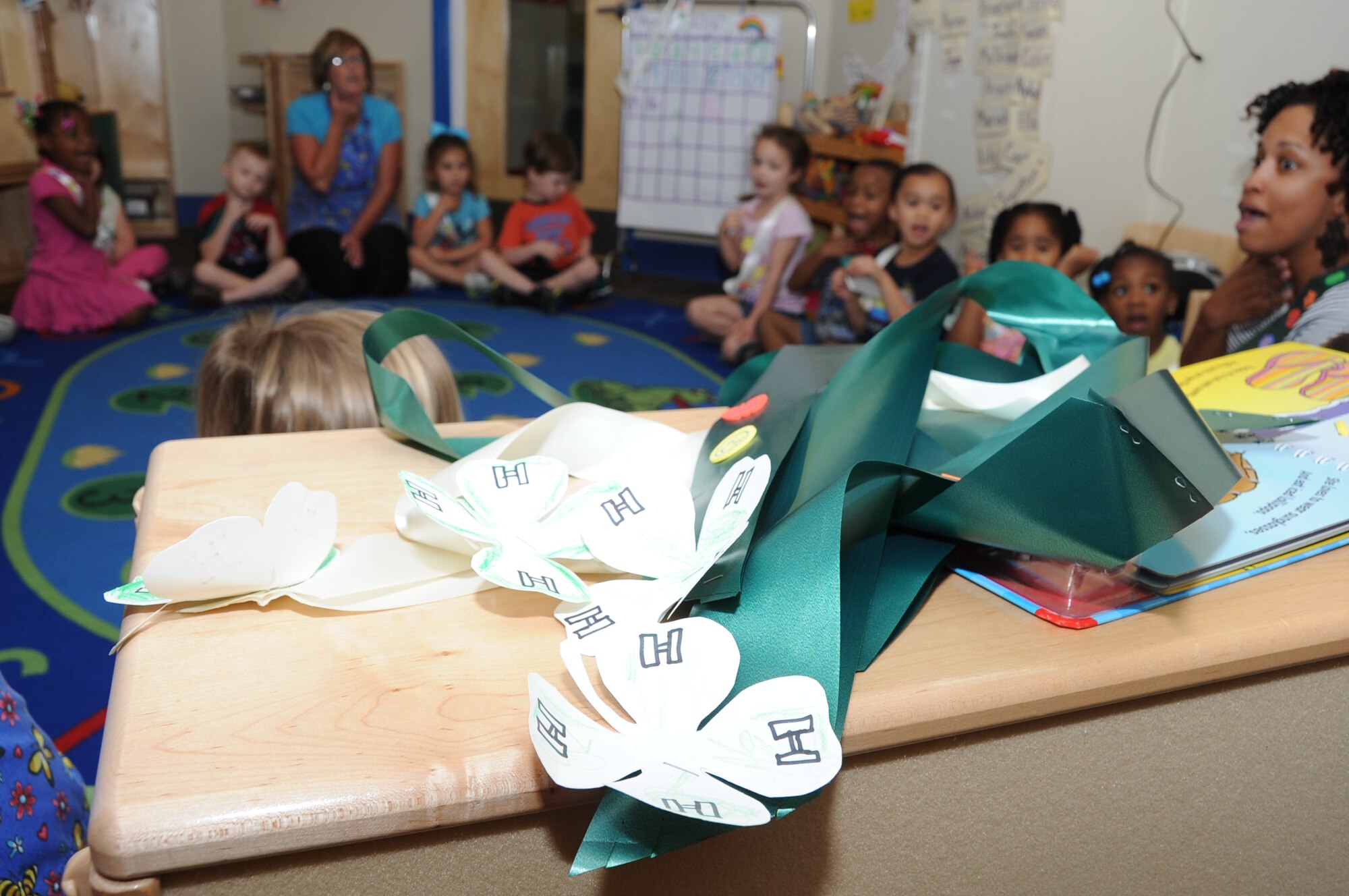The Keesler 4-H Cloverbuds program is an interactive curriculum-based program designed for 5-6 year olds.  The group meets twice a month while attending the Child Development Center at Keesler Air Force Base, Miss.  The children also make their own sash which they can earn stickers for while the class is in session.  (U.S. Air Force photo by Kemberly Groue)