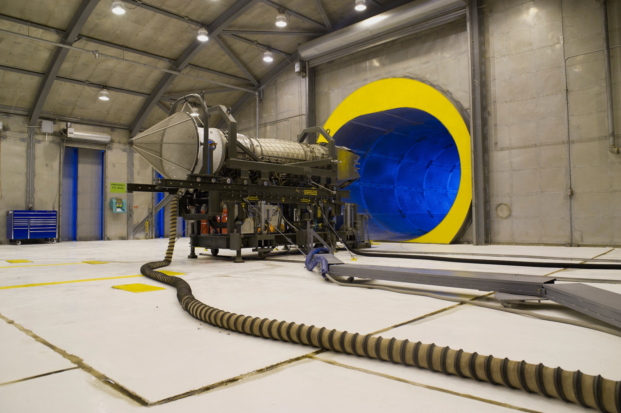 HOLLOMAN AIR FORCE BASE, N.M. – An F119-PW-100 jet engine sits in hush house April 19. Facilities like these are used to test aircraft engines, to perform routine checkups, as well as determine any rudimentary problems that may have arisen in flight. They provide protection to the personnel involved in the test as well as anyone outside of the facilities. The F119-PW-100 jet engine is the primary propulsion system for the F-22 Raptor. (U.S. Air Force photo by Airman 1st Class Michael A. Shoemaker/Released)
