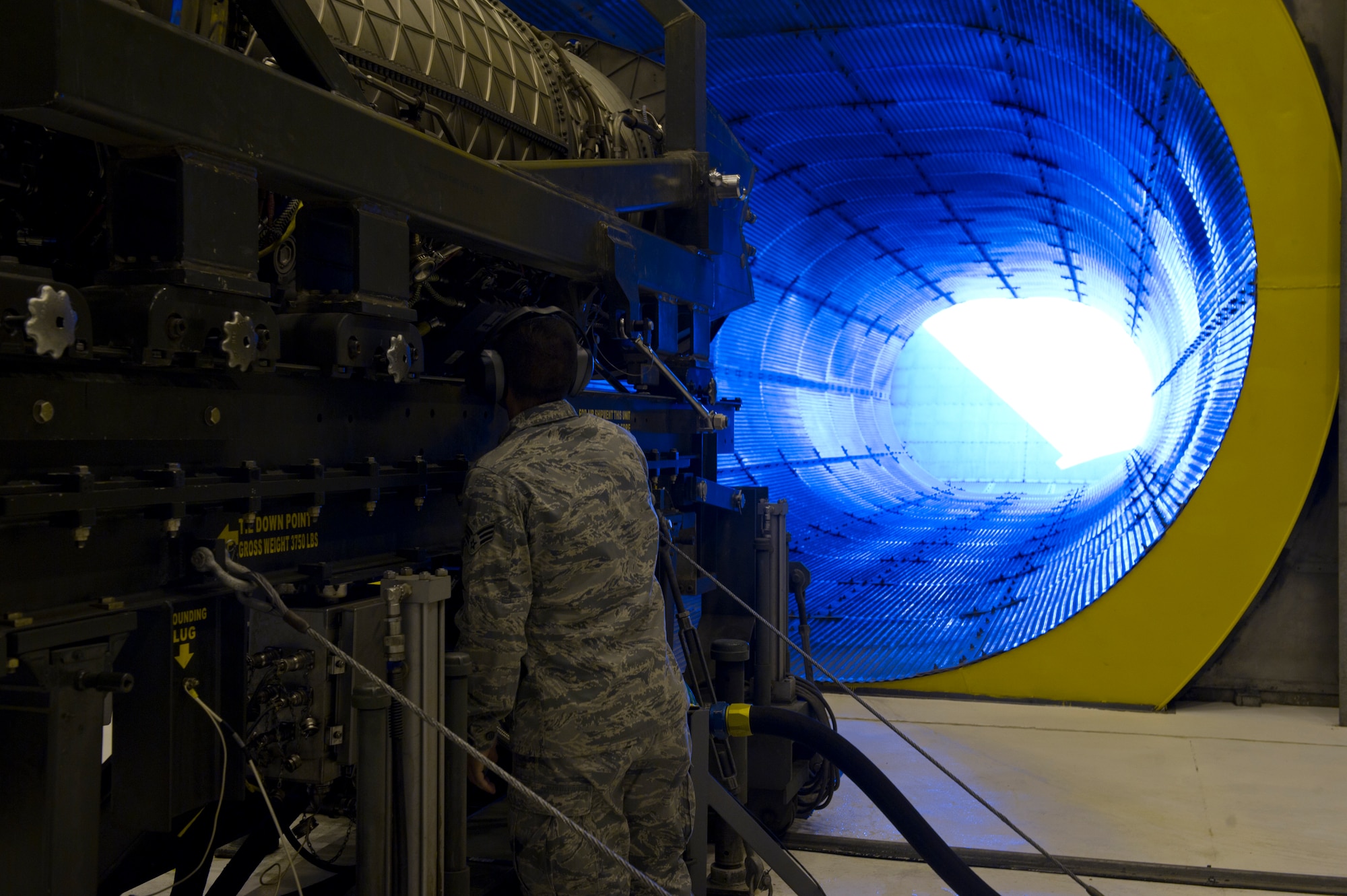 HOLLOMAN AIR FORCE BASE, N.M. – Senior Airman Christian Lucero, 49th Maintenance Squadron aerospace propulsion engineer, checks the components of an F119-PW-100 jet engine April 19. Safety precautions are always taken for the health and welfare of all personnel involved in the engine test. The F119-PW-100 jet engine is the primary propulsion system for the F-22 Raptor. (U.S. Air Force photo by Airman 1st Class Michael A. Shoemaker/Released)