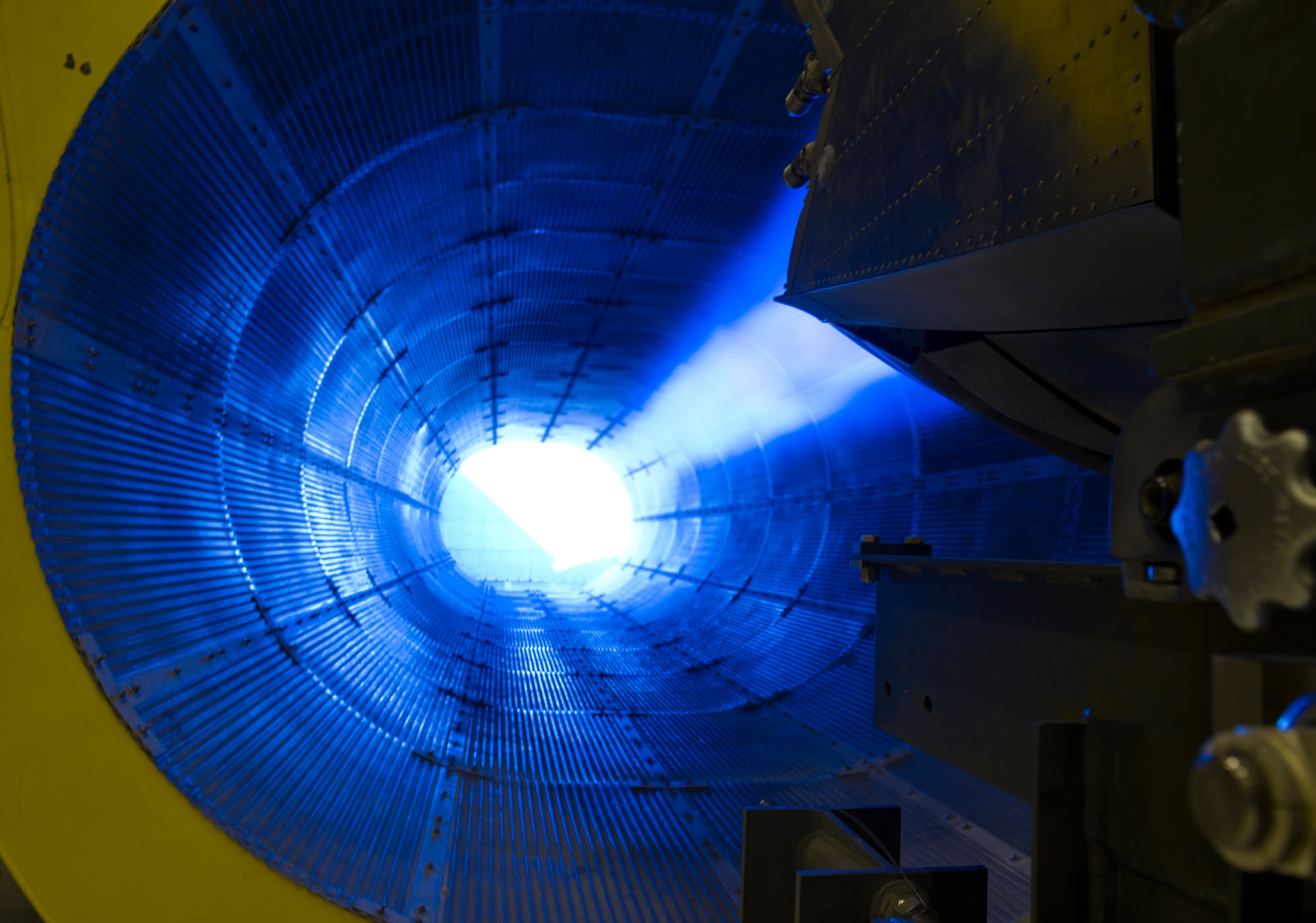 HOLLOMAN AIR FORCE BASE, N.M. – An F119-PW-100 jet engine is tested in a full afterburner state April 19. Airmen from the 49th Maintenance Squadron test aircraft engines like these in a specialized hangar, known as a hush house, to ensure that all components are functioning properly before use. The F119-PW-100 jet engine is the primary propulsion system for the F-22 Raptor. (U.S. Air Force photo by Airman 1st Class Michael A. Shoemaker/Released)