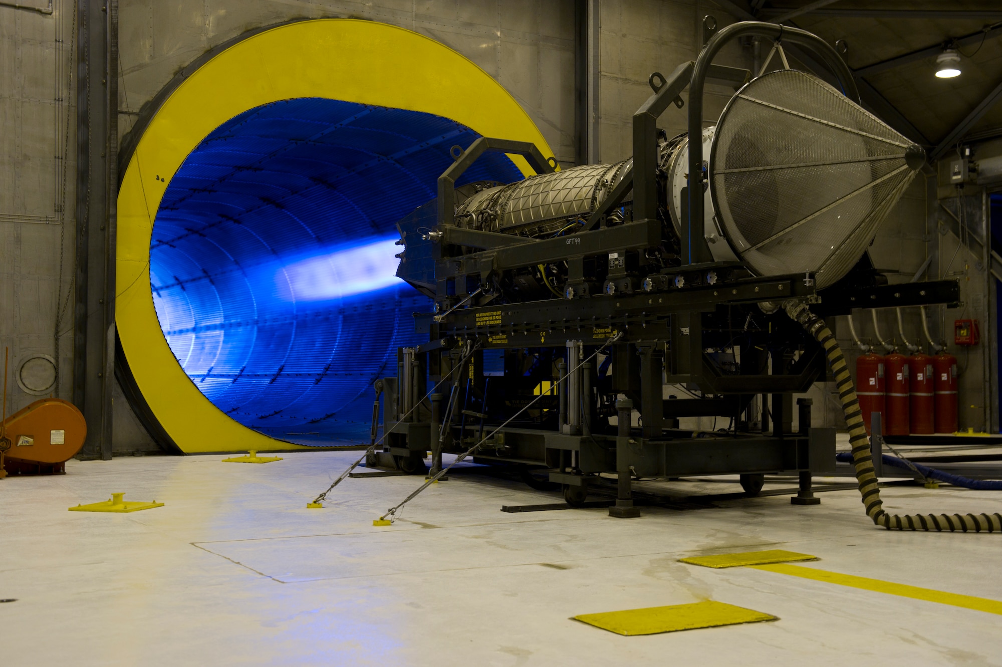 HOLLOMAN AIR FORCE BASE, N.M. – An F119-PW-100 jet engine is tested in a full afterburner state April 19. Airmen from the 49th Maintenance Squadron test aircraft engines like these in a specialized hangar, known as a hush house, to ensure that all components are functioning properly before use. The F119-PW-100 jet engine is the primary propulsion system for the F-22 Raptor. (U.S. Air Force photo by Airman 1st Class Michael A. Shoemaker/Released)
