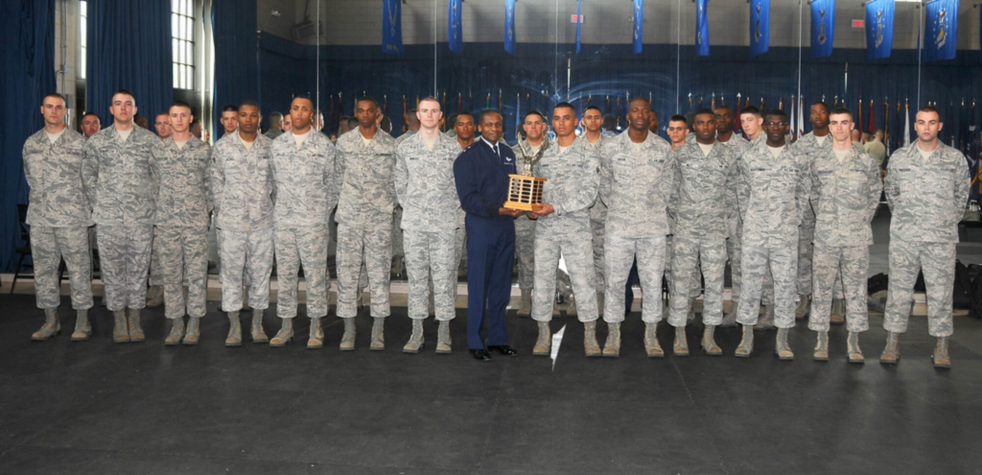 Air Force District of Washington Commander Maj. Gen. Darren W. McDew congratulated the U.S. Air Force Honor Guard Drill Team for winning the Joint Service Drill Exhibition on April 14 at the Jefferson Memorial in Washington, D.C. Drill teams from all four branches of the American armed services competed at the event. (U.S. Navy photo by Paul Bello)