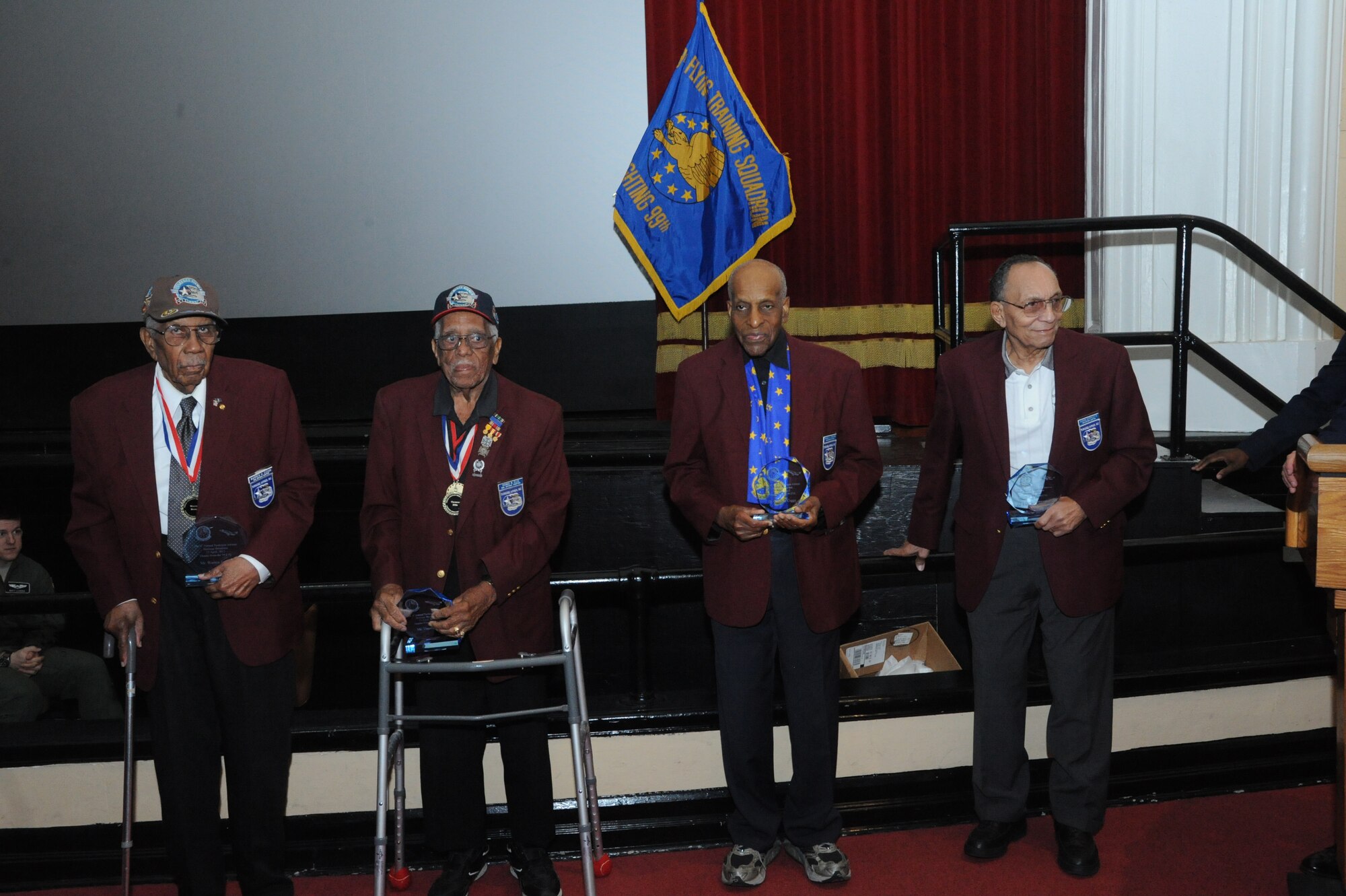 The contributions of Tuskegee Airmen Warren Eusan, Thomas Ellis, Dr. Granville Coggs and Dr. Eugene Derricotte were recognized during an event April 23 at the Joint Base San Antonio-Randolph Taj Mahal. The 99th Flying Training Squadron's fourth annual Tuskegee Heritage Breakfast paid tribute to the legacy of the segregated fighter group that fought fascism abroad and racism at home during World War II. (U.S. Air Force photo/Rich McFadden) 