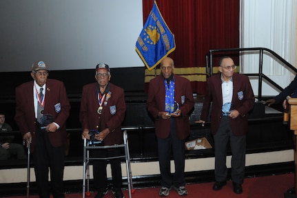 The contributions of Tuskegee Airmen Warren Eusan, Thomas Ellis, Dr. Granville Coggs and Dr. Eugene Derricotte were recognized during an event April 23 at the Joint Base San Antonio-Randolph Taj Mahal. The 99th Flying Training Squadron's fourth annual Tuskegee Heritage Breakfast paid tribute to the legacy of the segregated fighter group that fought fascism abroad and racism at home during World War II. (U.S. Air Force photo/Rich McFadden) 