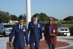 Lt. Col. Gavin Marks (left), 99th Flying Training Squadron director of operations, and Lt. Col. James Fisher, 99th FTS commander, greet Dr. Granville Coggs, Tuskegee Airman, as he arrives at the Taj Mahal Monday for the Tuskegee Heritage Breakfast. The 99th FlyingTraining Squadron's fourth annual Tuskegee Heritage Breakfast paid tribute to the legacy of the segregated fighter group that fought fascism abroad and racism at home during World War II. (U.S. Air Force photo/Rich McFadden) 