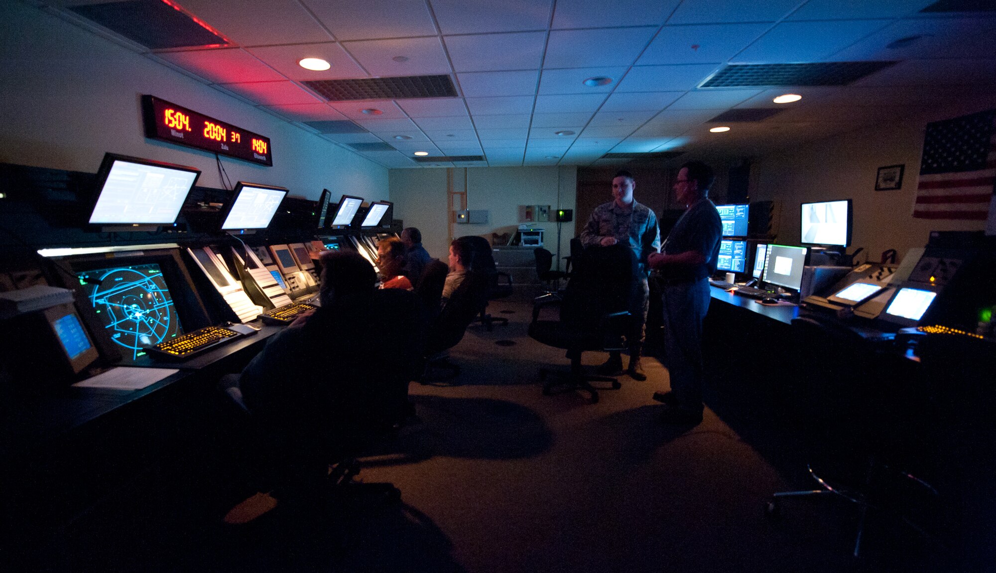 Members of the 28th Operations Support Squadron Radar Approach Control section manage the control room during normal operations at Ellsworth Air Force Base, S.D., April 19, 2012. 28th OSS RAPCON coordinates and provides safe flight patterns for all aircraft to help them to avoid any possible obstructions and prevent collisions. (U.S. Air Force photo by Airman 1st Class Alystria Maurer/Released)