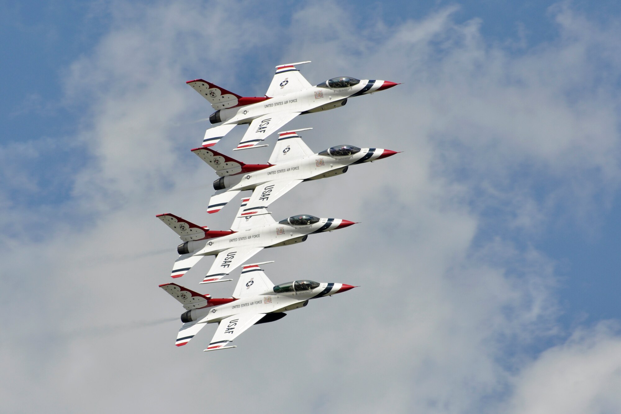 The U.S. Air Force Thunderbirds perform for the crowd at the 2012 Defenders of Liberty Air Show at Barksdale Air Force Base, La., April 22, 2012. Millions of people have witnessed the Thunderbirds demonstrations, and in turn, they’ve seen the pride, professionalism and dedication of hundreds of thousands of Airmen serving at home and abroad. (U.S. Air Force photo by Master Sgt. Jeff Walston)