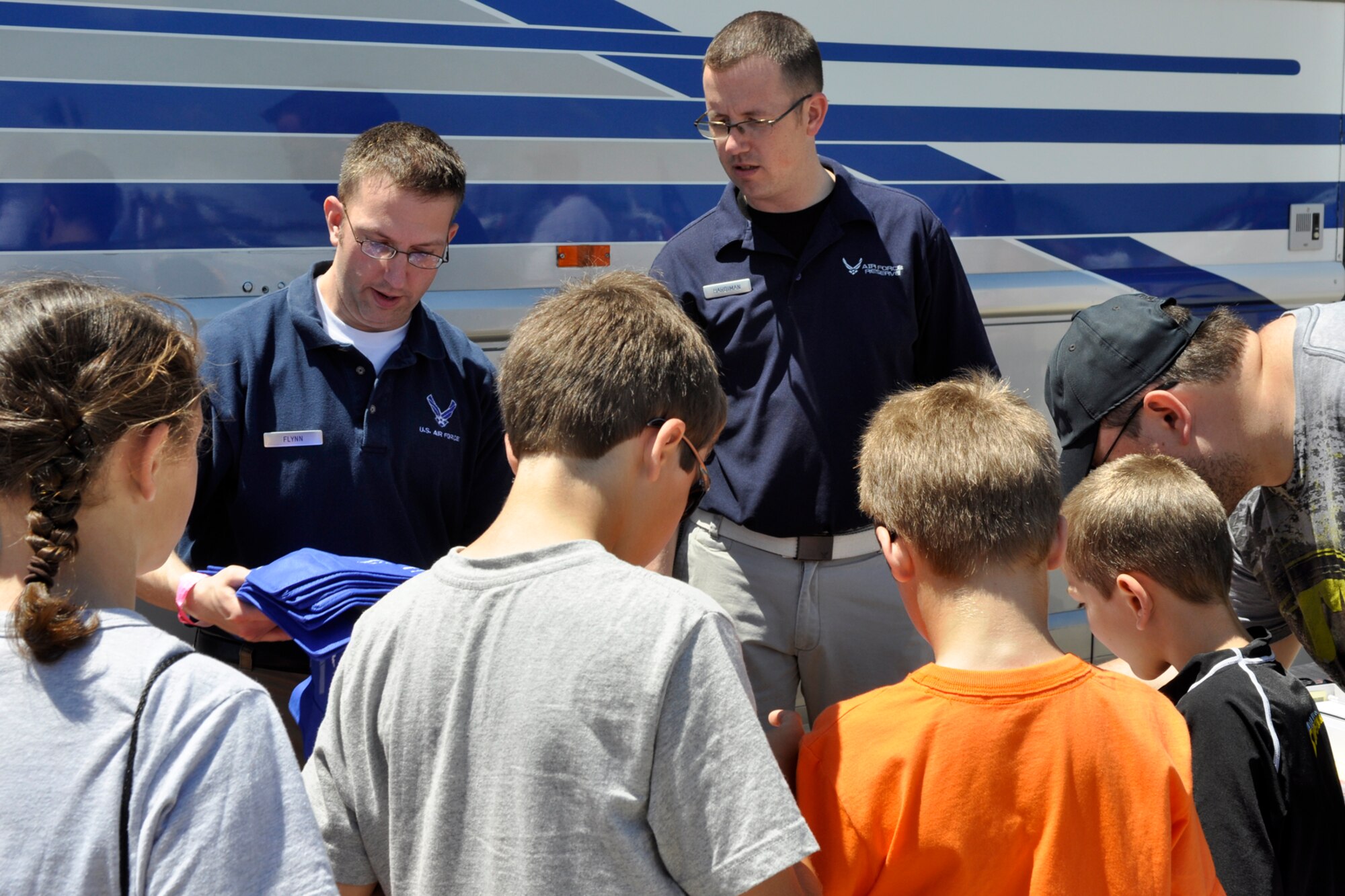 Tech. Sgt. Samuel Flynn and Tech. Sgt. Jon Hardiman, talk with possible Air Force candidates at the 2012 Defenders of Liberty Air Show at Barksdale Air Force Base, La., April 22, 2012. Both sergeants are line recruiters for the 307th Bomb Wing, who enlist for the Air Force Reserve Command at Barksdale. The 307 BW and 917th Fighter Group provided static displays for the air show. (U.S. Air Force photo by Master Sgt. Jeff Walston)