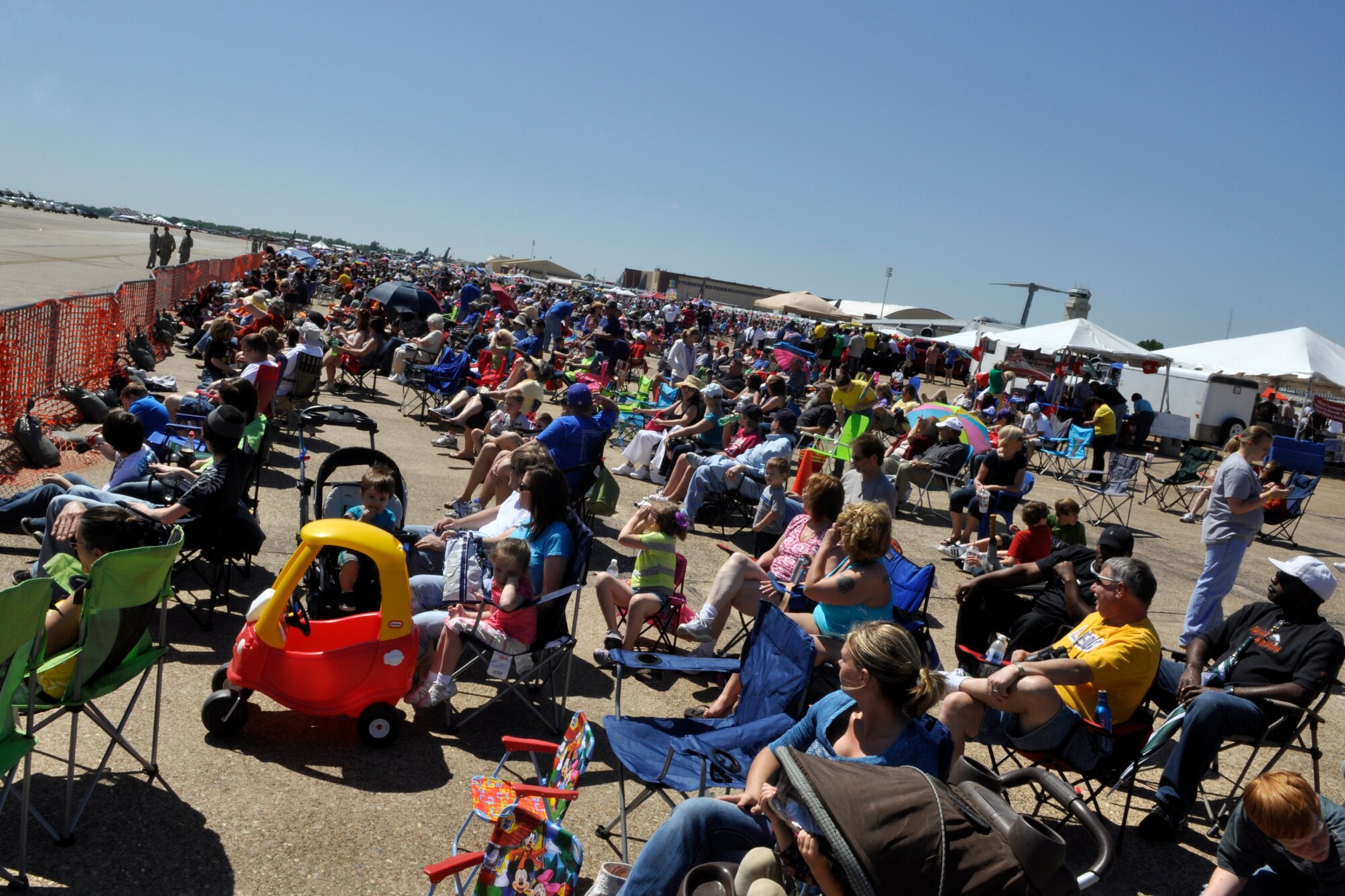 Thousands of spectators experience the 2012 Defenders of Liberty Air Show at Barksdale Air Force Base, La., April 22, 2012. Both the 307th Bomb Wing and 917th Fighter Group provided static displays for the air show. (U.S. Air Force photo by Master Sgt. Jeff Walston)