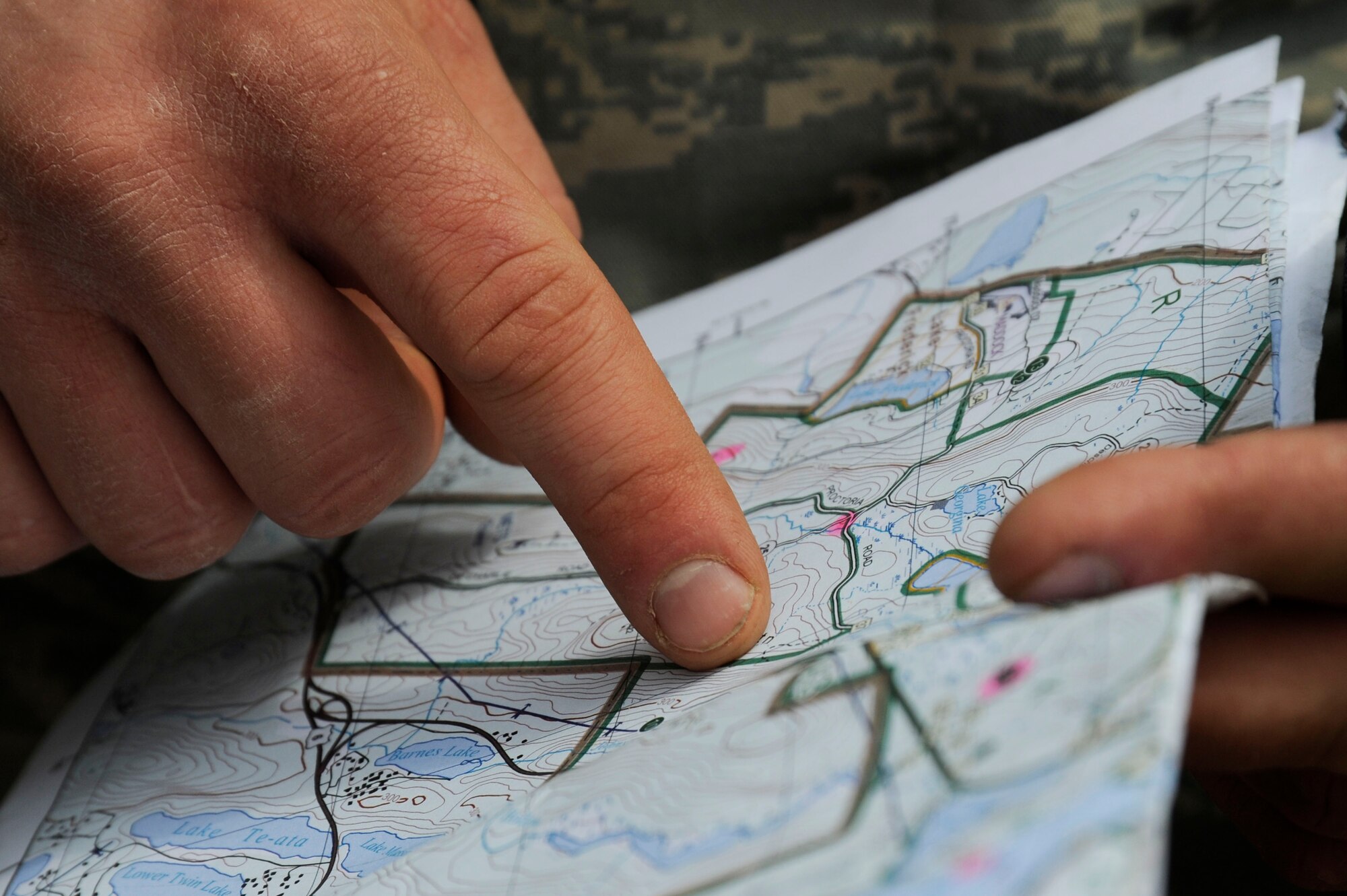A U.S. Air Force Academy cadet plans a route April 18, 2012, for the land navigation portion of the 2012 Sandhurst Competition at the U.S. Military Academy in West Point, N.Y. The two-day competition included cadets from around the world. (U.S. Air Force photo/Tech. Sgt. Mareshah Haynes)