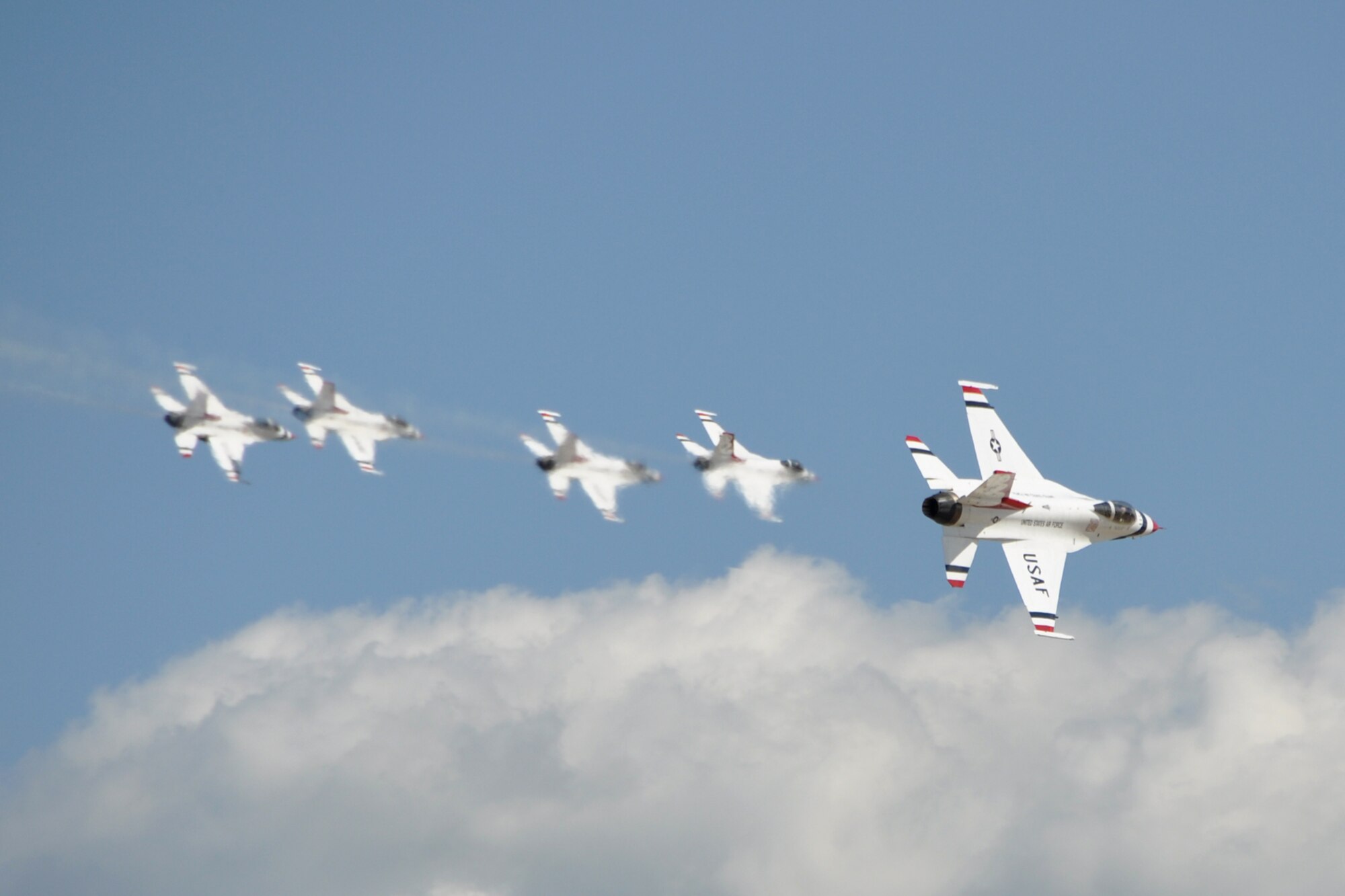 The U.S. Air Force Thunderbirds perform for the crowd at the 2012 Defenders of Liberty Air Show at Barksdale Air Force Base, La., April 22, 2012. Millions of people have witnessed the Thunderbirds demonstrations, and in turn, they’ve seen the pride, professionalism and dedication of hundreds of thousands of Airmen serving at home and abroad. (Courtesy photo by Eva Klimentova)