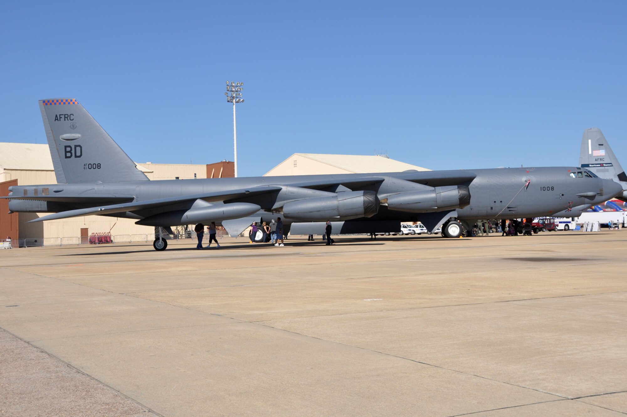 Early birds to the 2012 Defenders of Liberty Air Show get a close up look at a 307th Bomb Wing B-52 Stratofortress during the Barksdale Air Force Base, La., April 22, 2012. Both the 307 BW and 917th Fighter Group provided static displays for the air show. (Courtesy photo by Eva Klimentova)