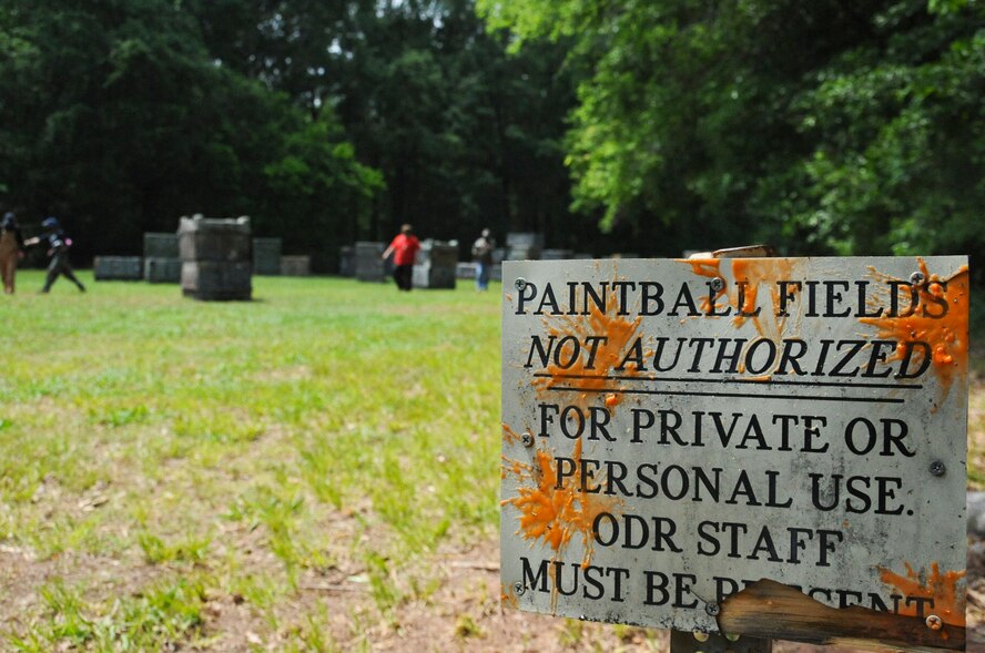 Paintball patrons walk off of the paintball field after a match on Barksdale Air Force Base, La., April 15. In the past, on base paintball courses were managed by Outdoor Recreation, but as of April 7, Splat Zone entered a contract with the base to manage and maintain the paintball fields.  (U.S. Air Force photo/Airman 1st Class Micaiah Anthony)(RELEASED)