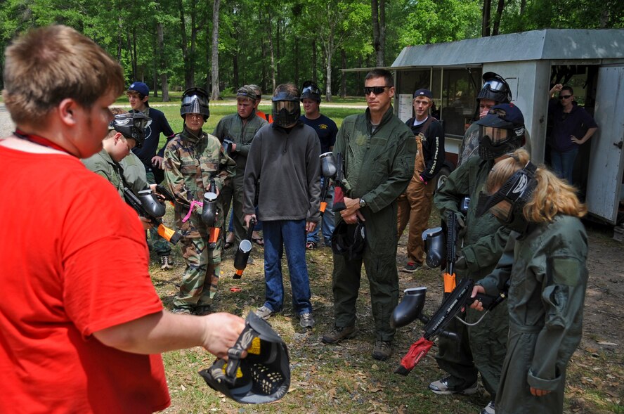 Seth Teutsch, Splat Zone referee, briefs paintball patrons about safety equipment and rules on Barksdale Air Force Base, La., April 15. In the past, on-base paintball courses were managed by Outdoor Recreation, but as of April 7, Splat Zone entered a contract with the base to manage and maintain the paintball fields.  (U.S. Air Force photo/Airman 1st Class Micaiah Anthony)(RELEASED)
