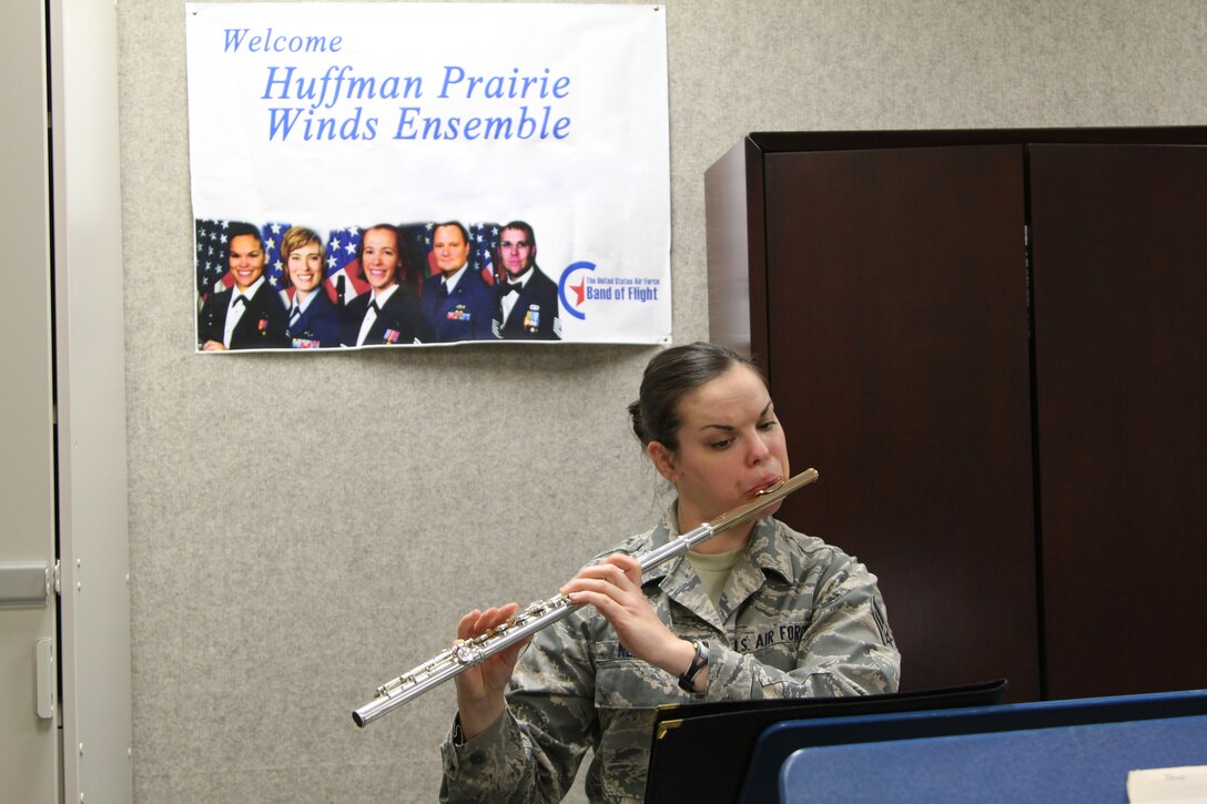 Airman First Class Jennifer Nelson prepares a difficult musical passage with the Huffman Prairie Winds. (U.S. Air Force photo/SSgt John Hardisky) 