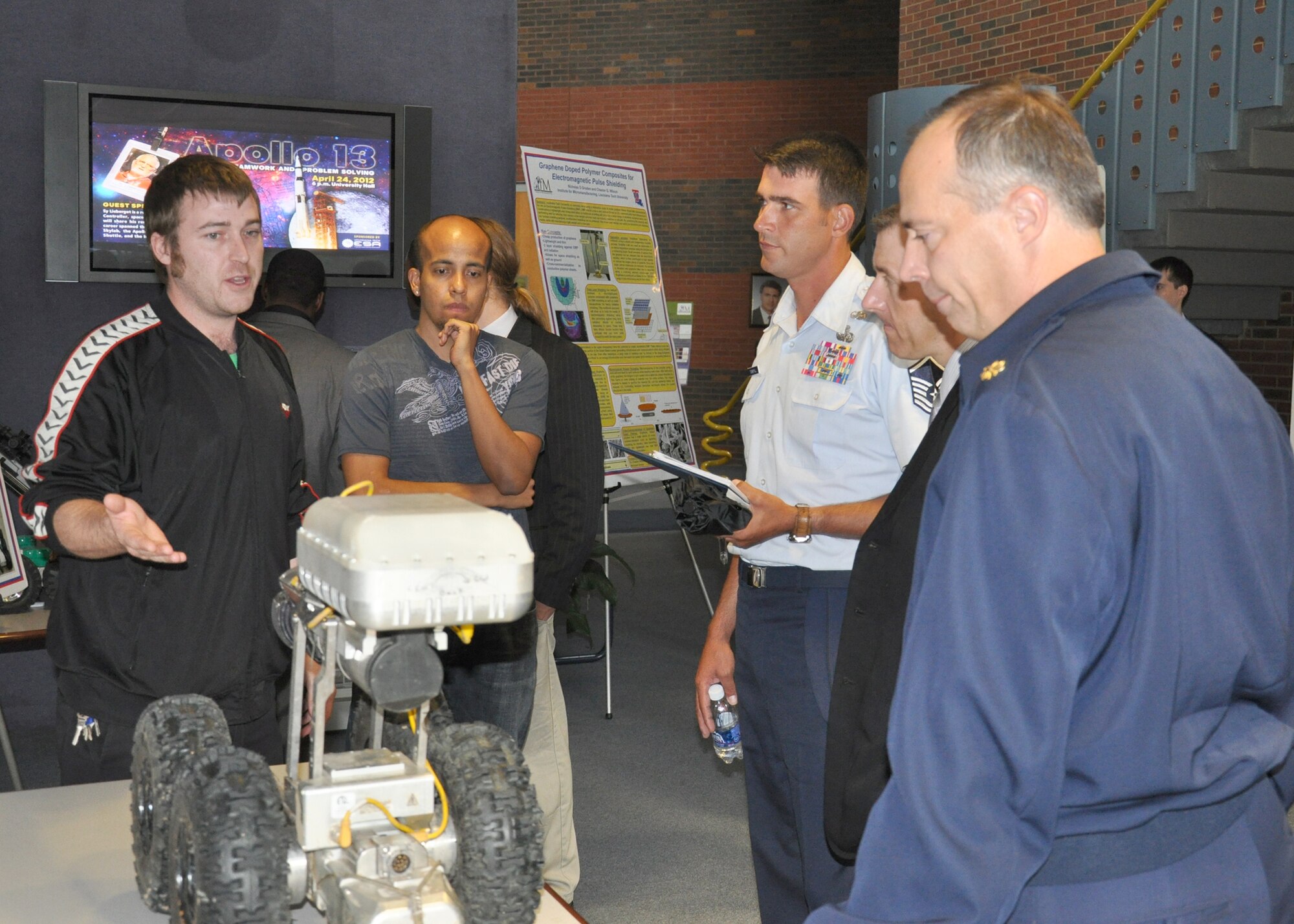 RUSTON, La. - A Louisiana Tech student demonstrates a proto-type of a radar-based system designed to provide information on conditions that have the potential to harm drinking water and wastewater pipelines or interfere with their operation. Several students and professors discussed ongoing energy and conservation initiatives with members of the Air Force Global Strike Command Energy Management Steering Group during their visit to the university April 20. (U.S. Air Force photo by Carla Pampe)