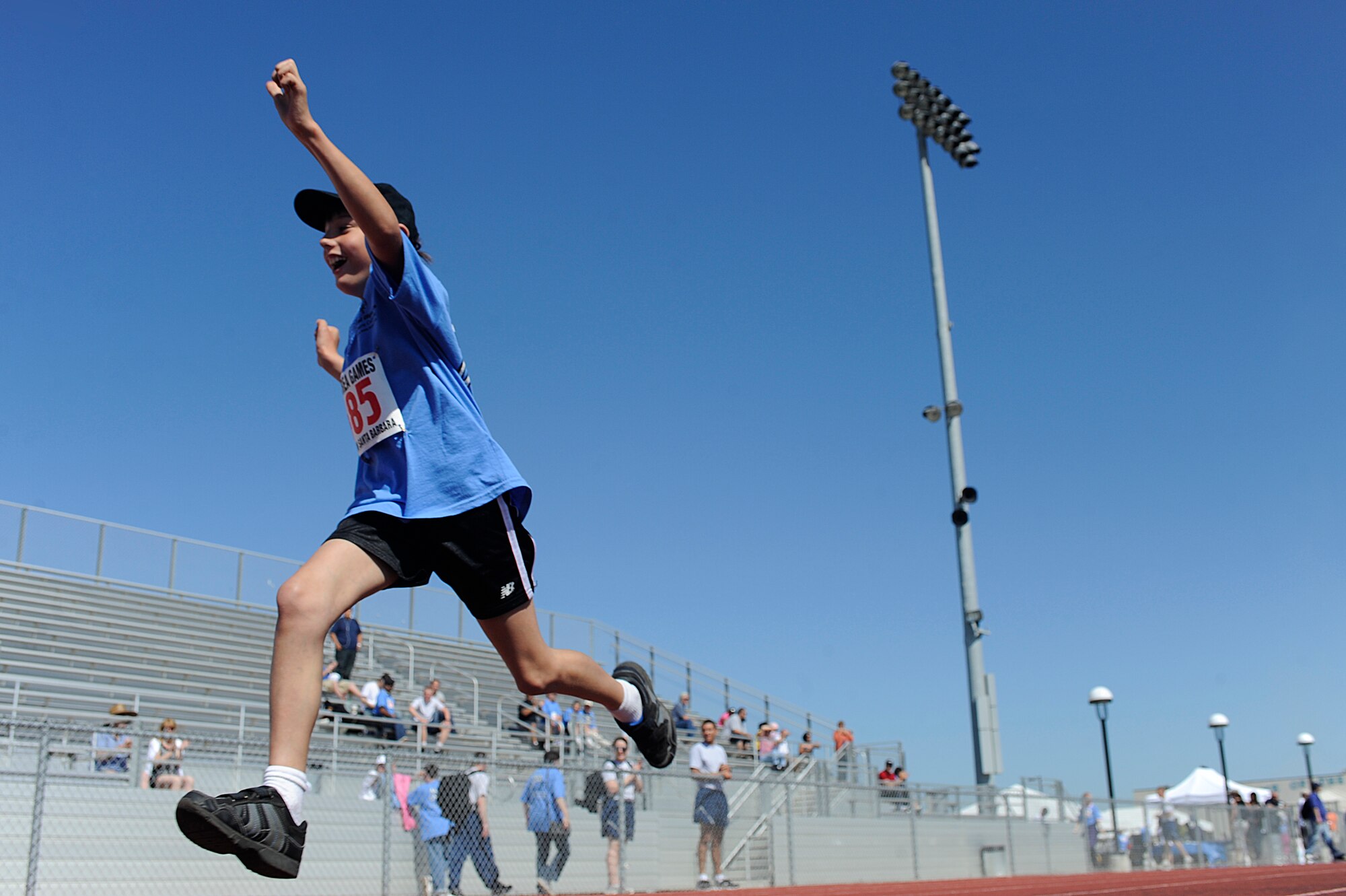 VANDENBERG AIR FORCE BASE, Calif. -- JT Sheehan, a Special Olympics athlete, finishes a race during the Northern Santa Barbara County Special Olympics event at Pioneer Valley High School, Santa Maria Saturday, April 21, 2012.The Special Olympics competition is an international event that held their first summer games in Chicago, Ill. (U.S. Air Force photo/Staff Sgt. Andrew Satran) 

 
  