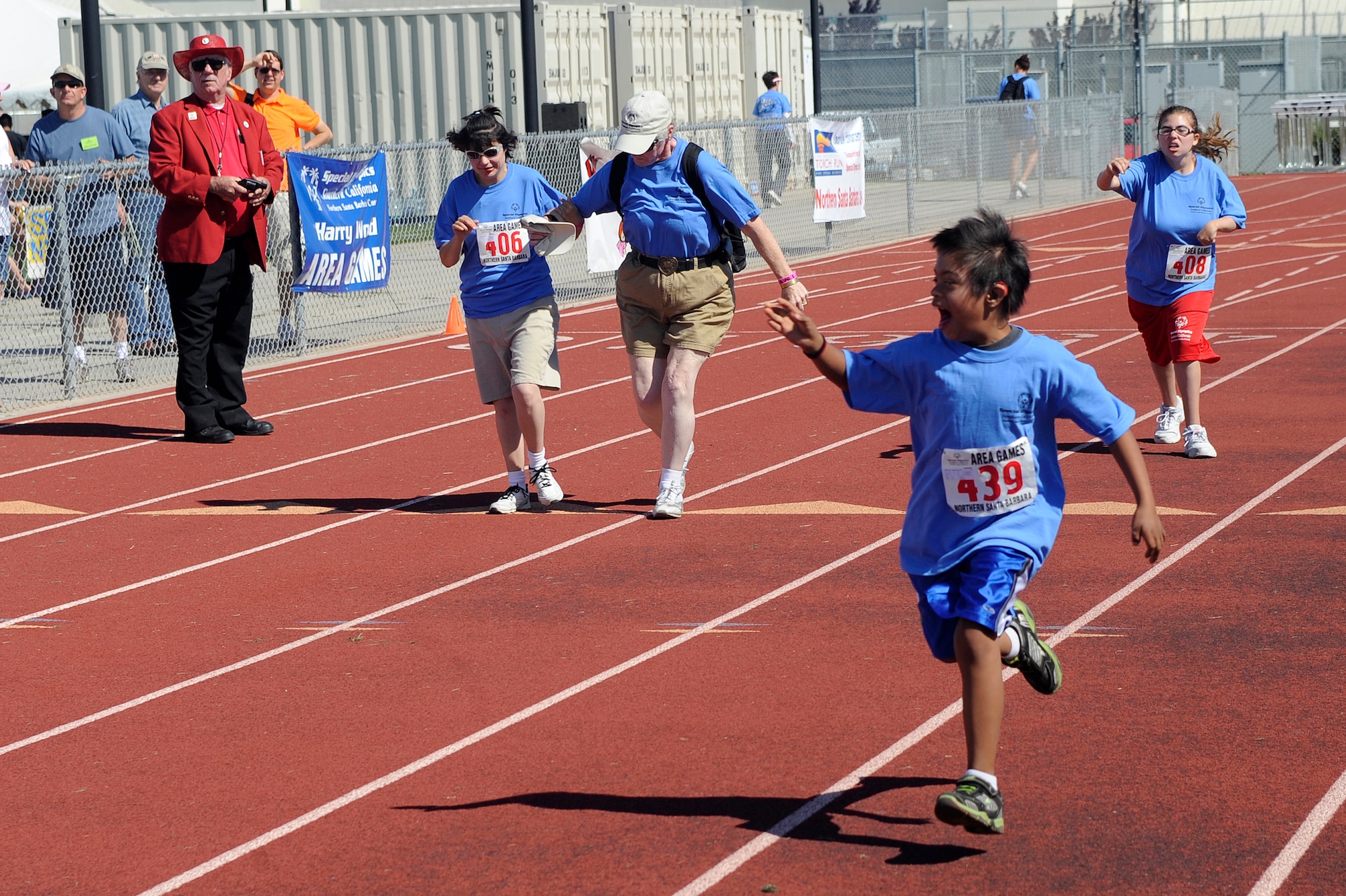 VANDENBERG AIR FORCE BASE, Calif. -- Special Olympics athletes run a 100 yard dash during the Northern Santa Barbara County Special Olympics event at Pioneer Valley High School, Santa Maria Saturday, April 21, 2012. The Special Olympics competition is an international event that held their first summer games in Chicago, Ill. (U.S. Air Force photo/Staff Sgt. Andrew Satran) 

 