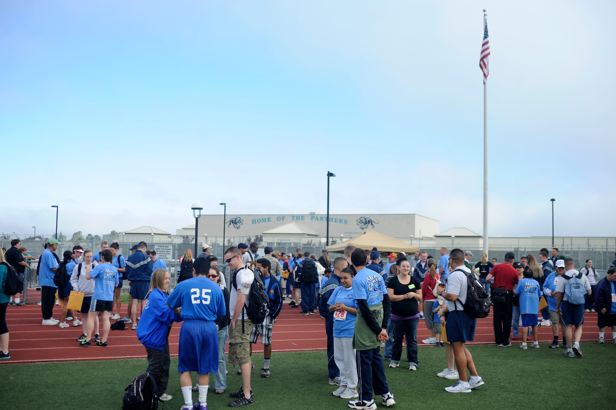 VANDENBERG AIR FORCE BASE, Calif. -- Team V volunteers wait with their athletes before the competition during the Northern Santa Barbara County Special Olympics event at Pioneer Valley High School, Santa Maria Saturday, April 21, 2012. Team V members have volunteered with the Northern Santa Barbara County Special Olympics for more than 30 years. More than 145 base volunteers from 19 organizations participated in the event this year. (U.S. Air Force photo/Staff Sgt. Andrew Satran) 

 