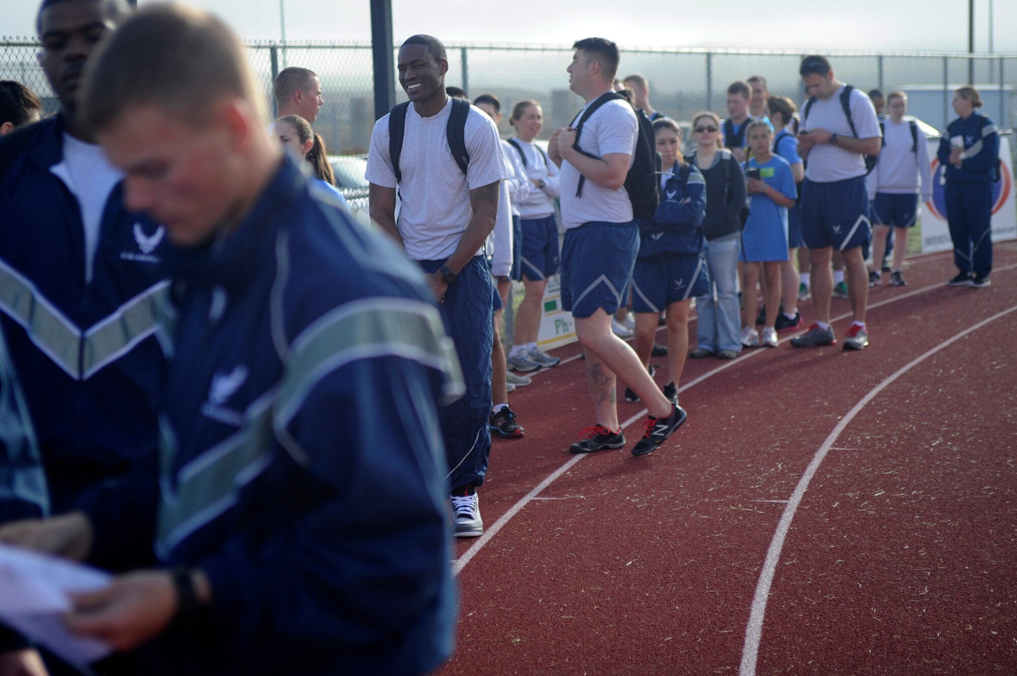 VANDENBERG AIR FORCE BASE, Calif. -- Team V volunteers wait to pair up with their athlete during the Northern Santa Barbara County Special Olympics event at Pioneer Valley High School, Santa Maria Saturday, April 21, 2012. Team V members have volunteered with the Northern Santa Barbara County Special Olympics for more than 30 years. More than 145 base volunteers from 19 organizations participated in the event this year. (U.S. Air Force photo/Staff Sgt. Andrew Satran) 

 